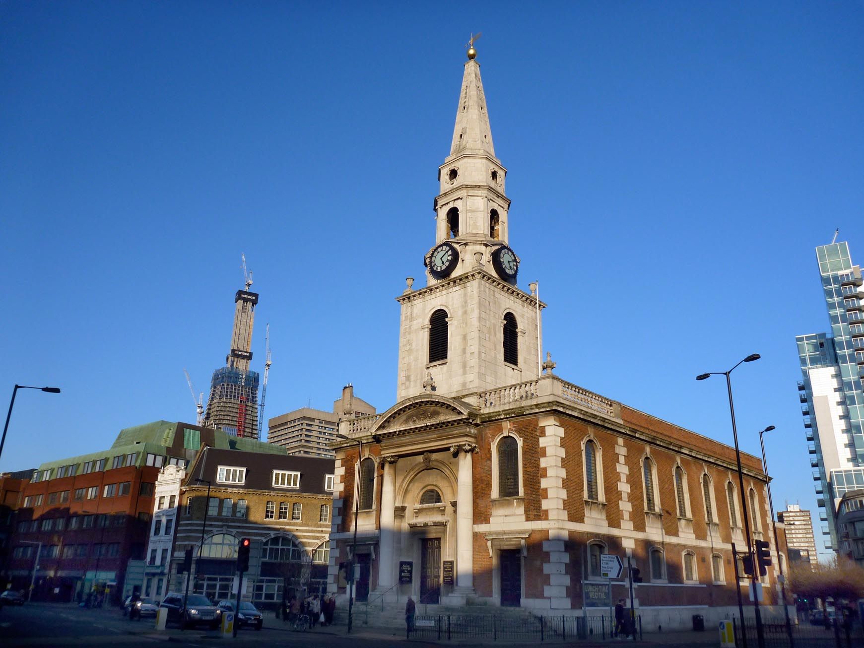 St George the Martyr Church with clock tower, ideal for unique events in urban setting.