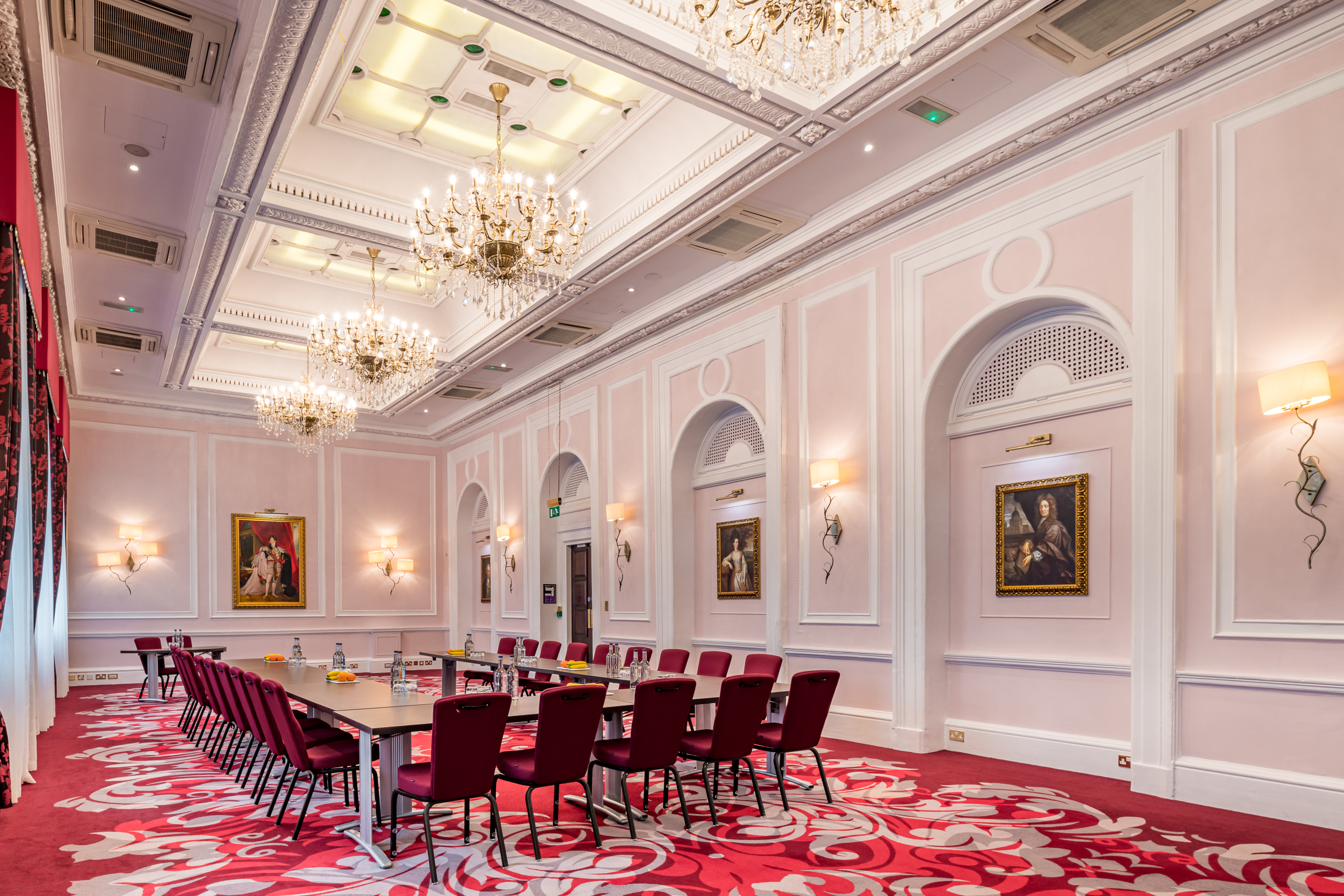 Sophisticated meeting room at The Clermont Charing Cross with elegant chandeliers for corporate events.