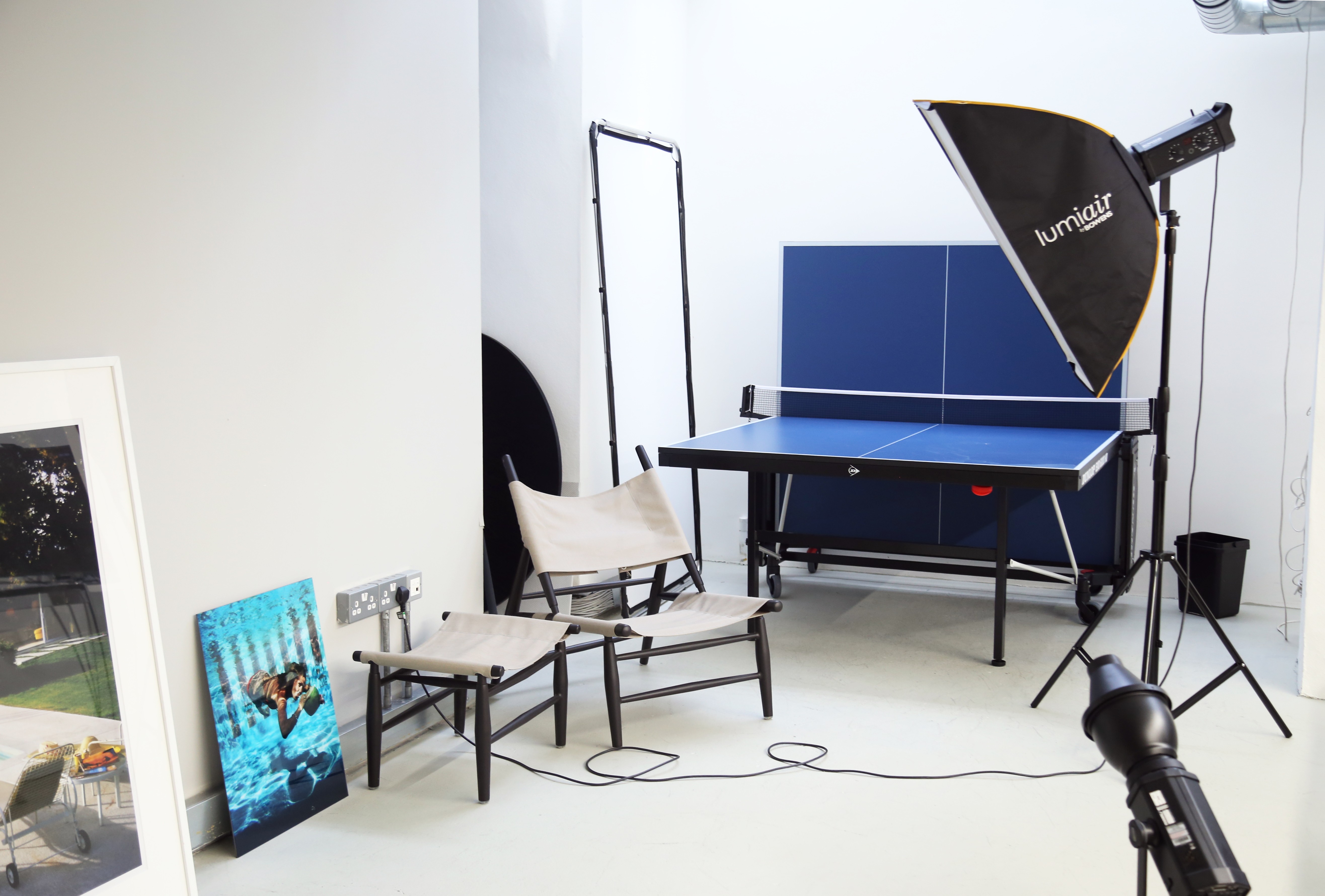Versatile event space with ping pong table for team-building and creative sessions.