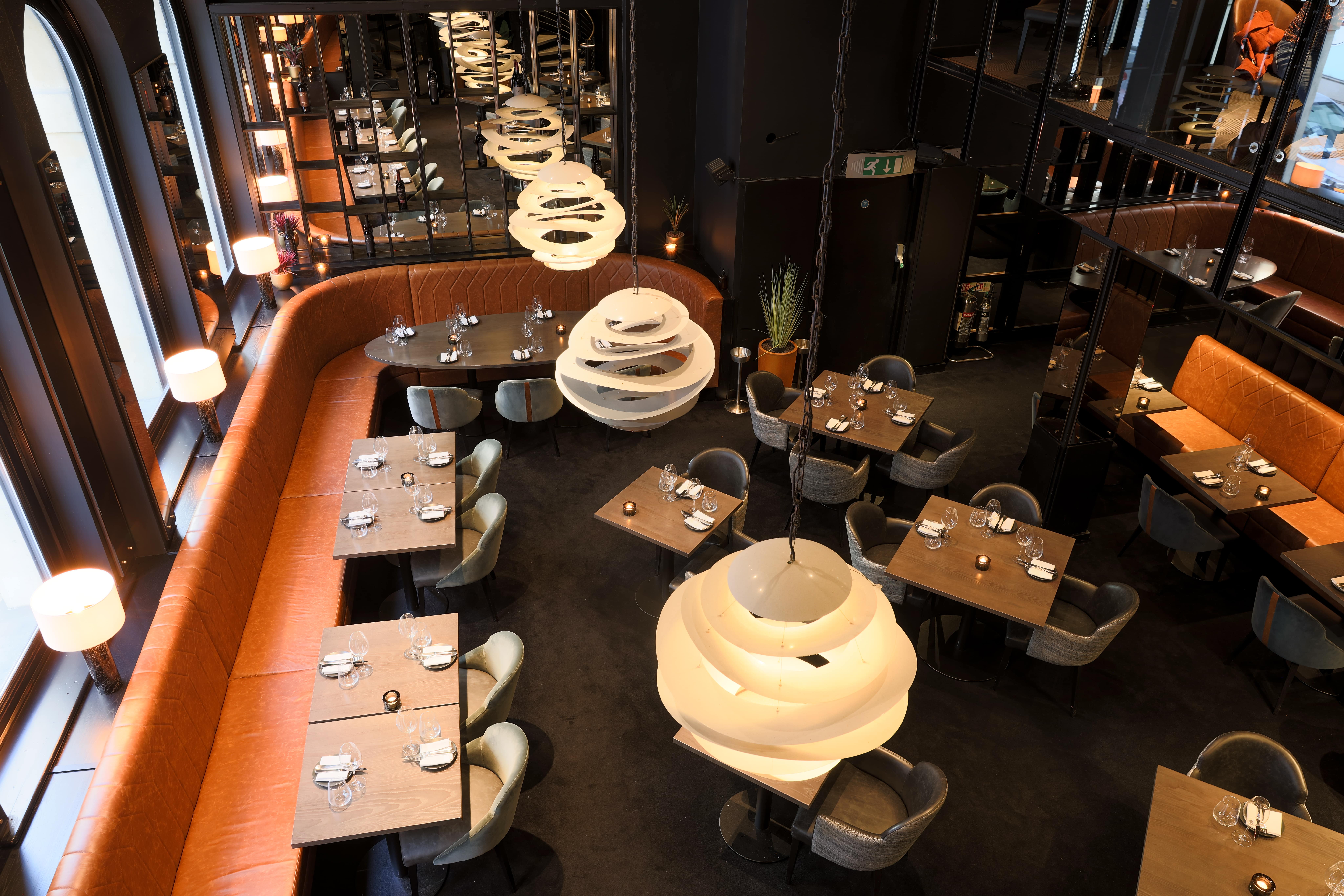 Modern restaurant venue with stylish decor for corporate events and intimate gatherings.