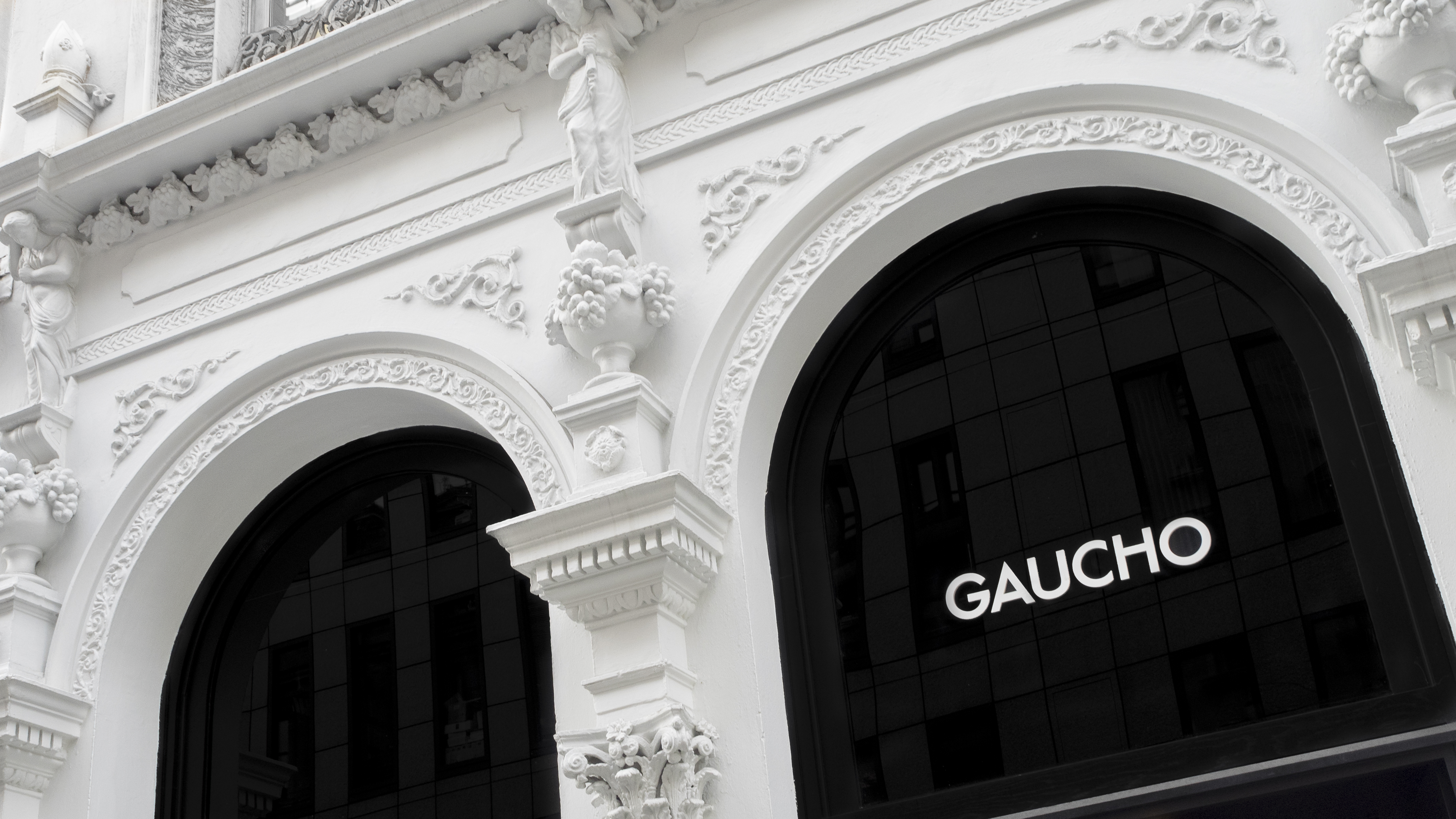 Elegant venue with arched windows for upscale events at Gaucho Chancery Lane.