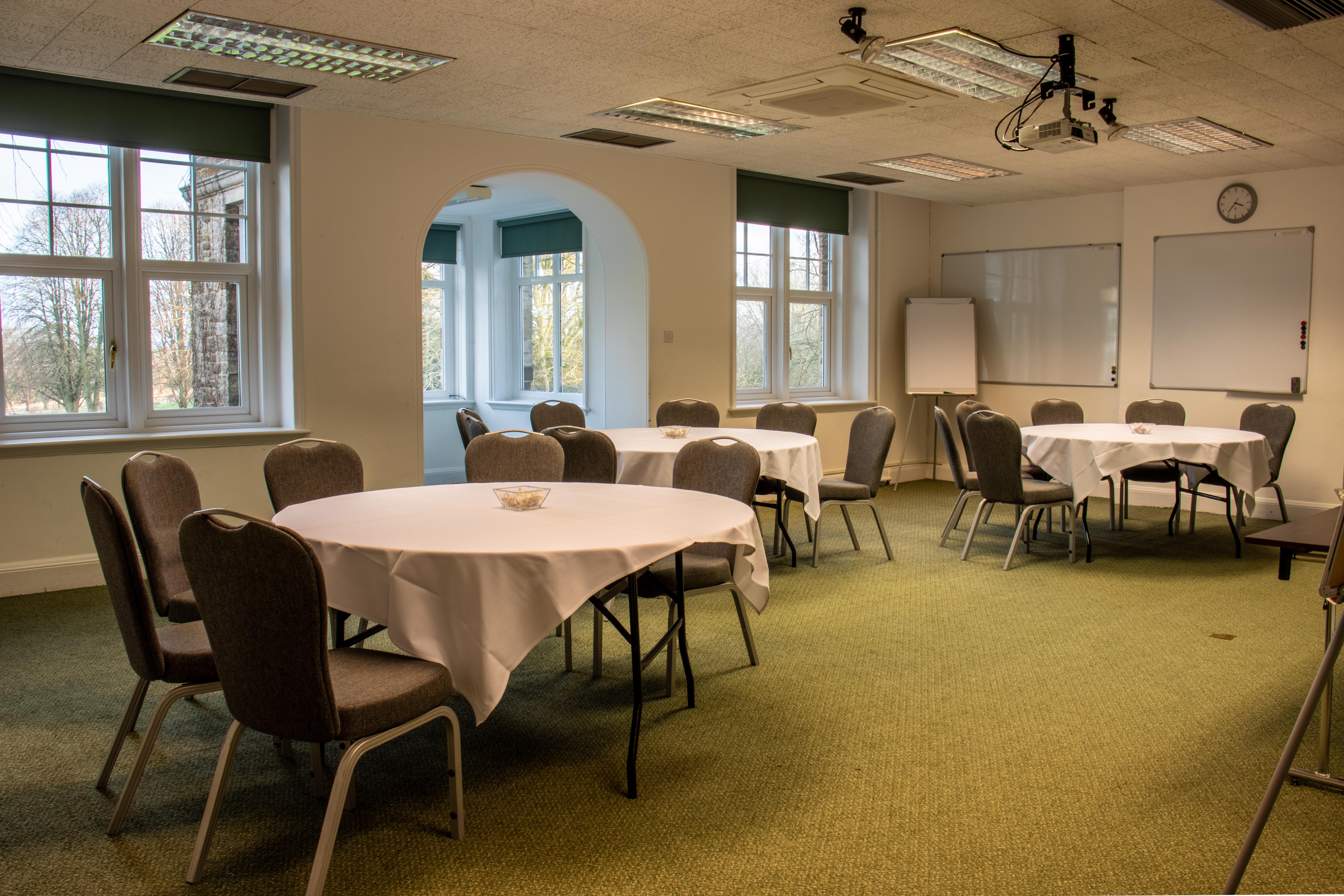 Sir Francis Page in a versatile meeting space with round tables for workshops.