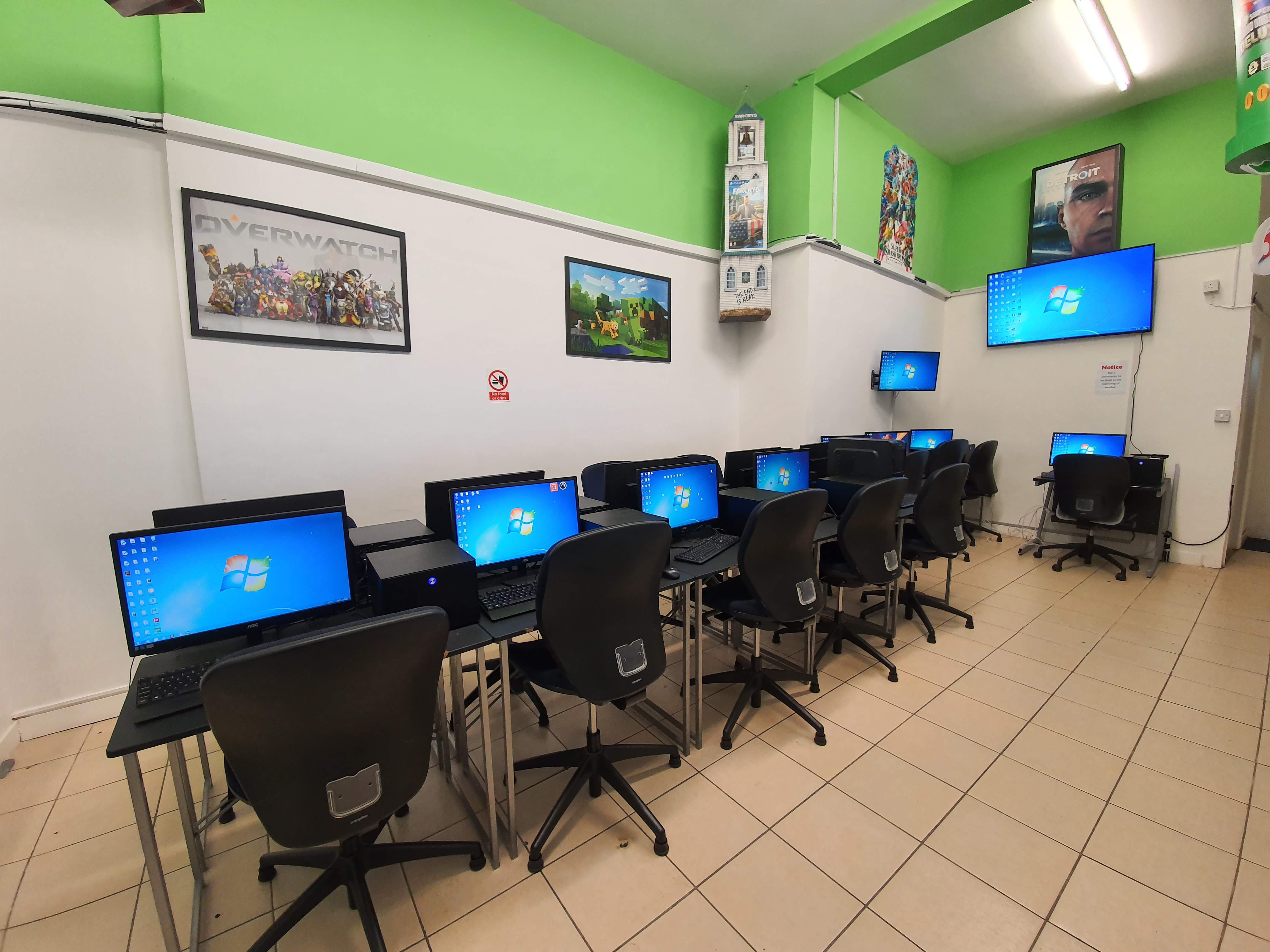 Tech-equipped meeting space with computers for workshops and training sessions.
