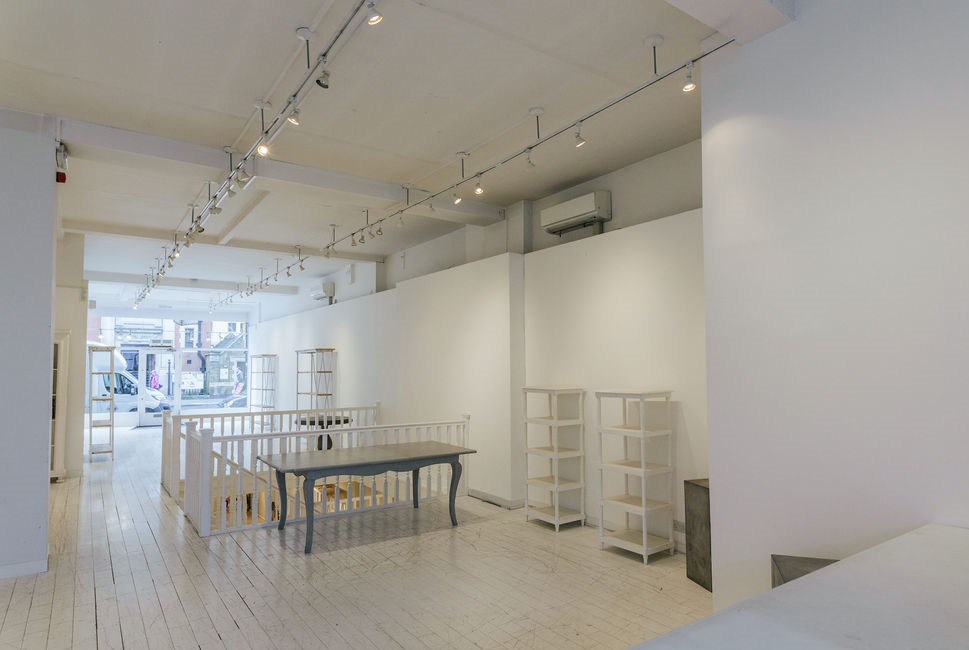 Versatile minimalist event space at 725 Fulham Road for workshops and pop-up events.