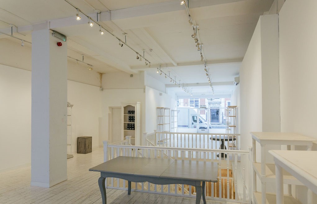 Versatile minimalist event space with bright lighting at 725 Fulham Road.