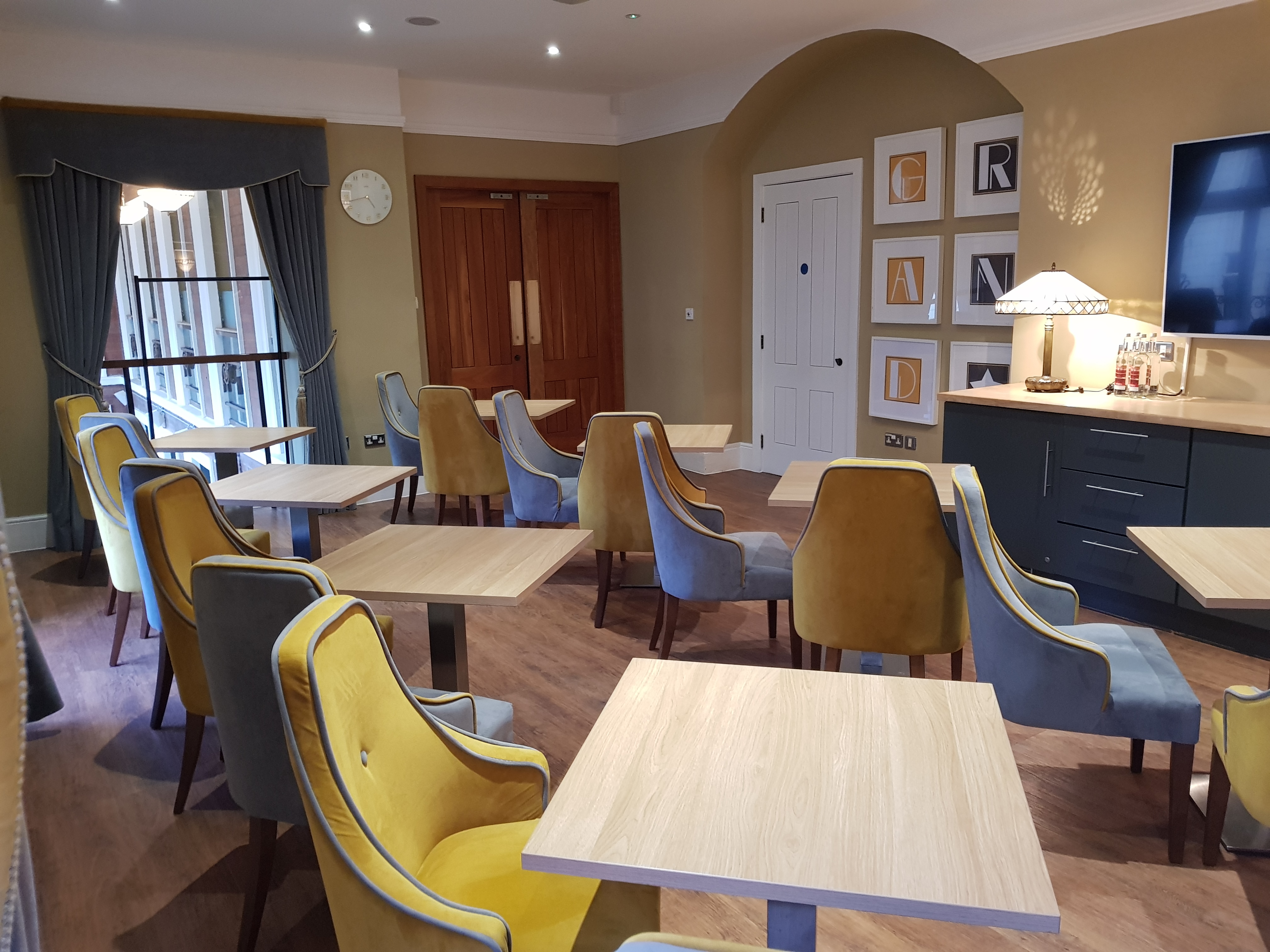 Spotlight Lounge at Wolverhampton Grand Theatre, colorful chairs for meetings and events.