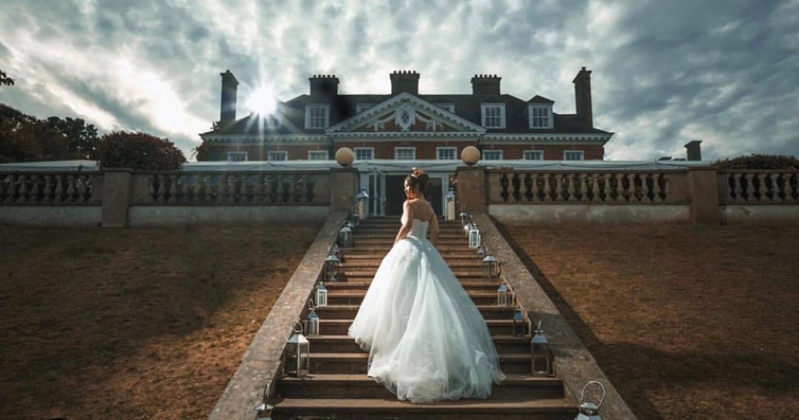 Bride in elegant gown at Terrace Marquee, Hunton Park Hotel, perfect for weddings.
