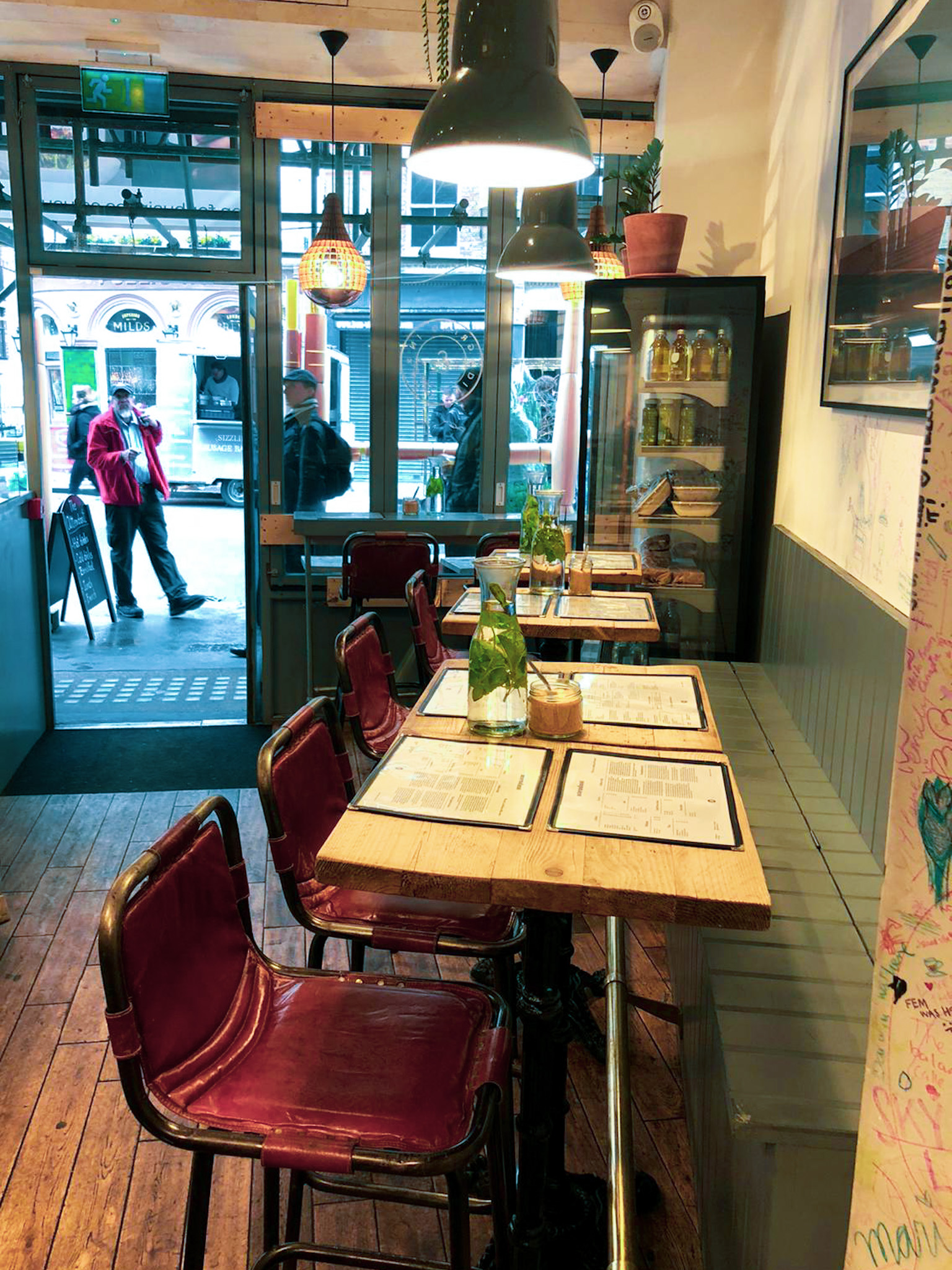 Cozy dining space in Attendant Clerkenwell, ideal for networking events and casual gatherings.