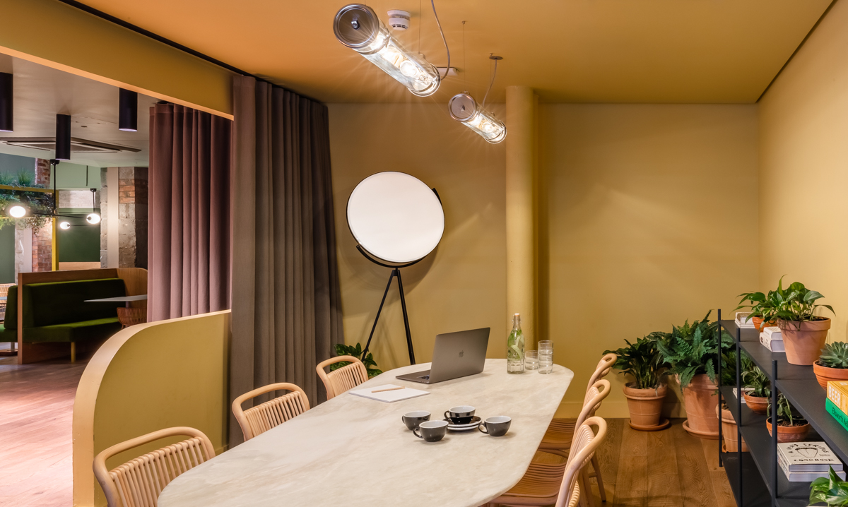 Modern Yellow Room at Whitworth Locke, perfect for creative meetings and brainstorming.