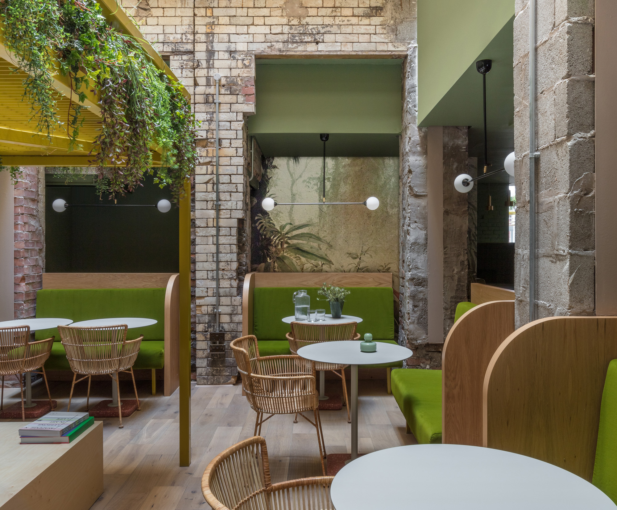 Modern coworking space with cozy booths for networking and casual meetings in Whitworth Locke.