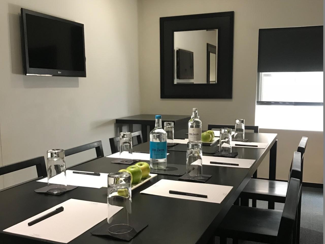 Modern Meeting Room 26 at La Suite West Hotel, perfect for professional gatherings.