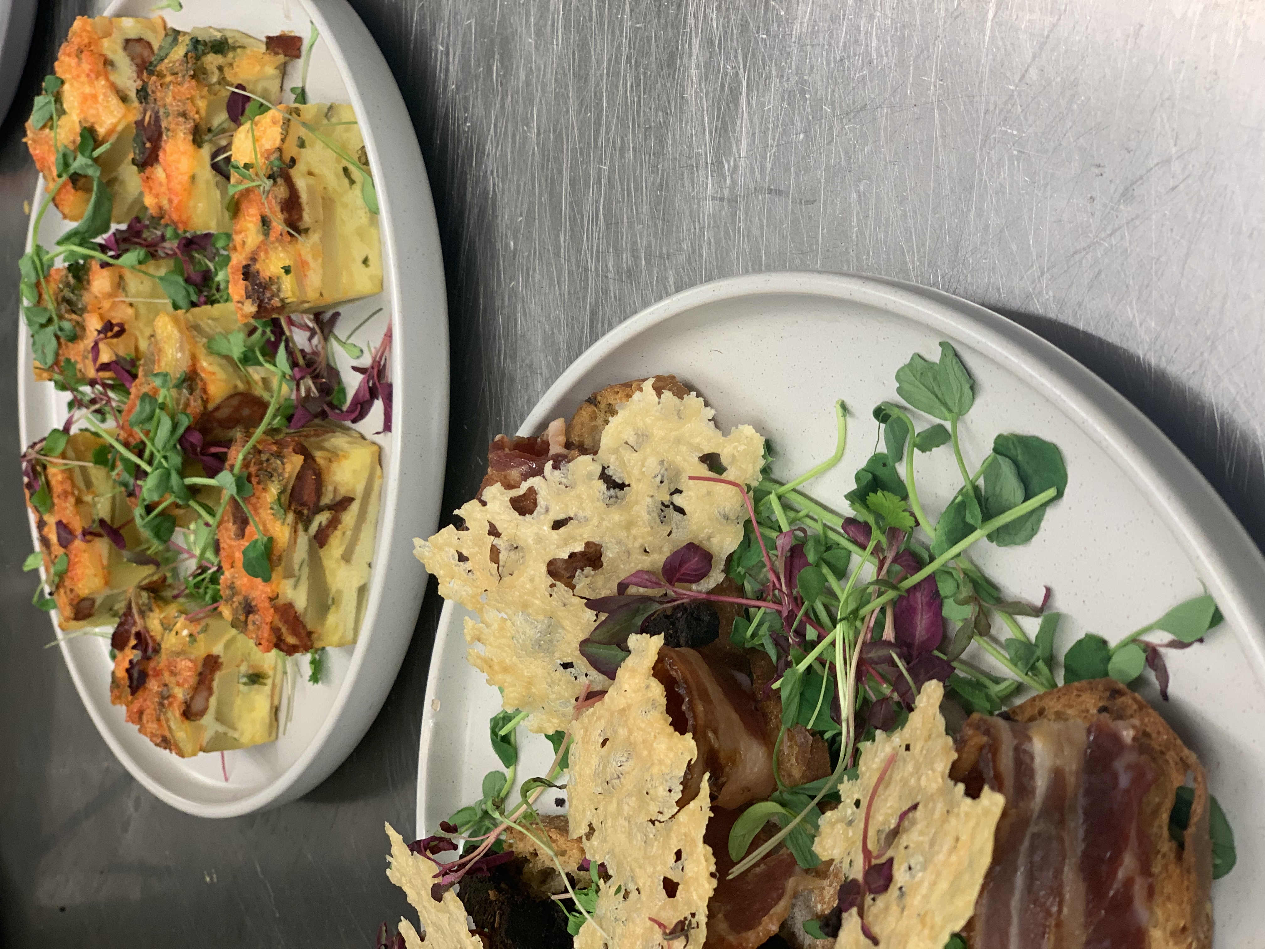 Elegant plated dish with microgreens for high-end event catering at Maddison's Bar & Kitchen.