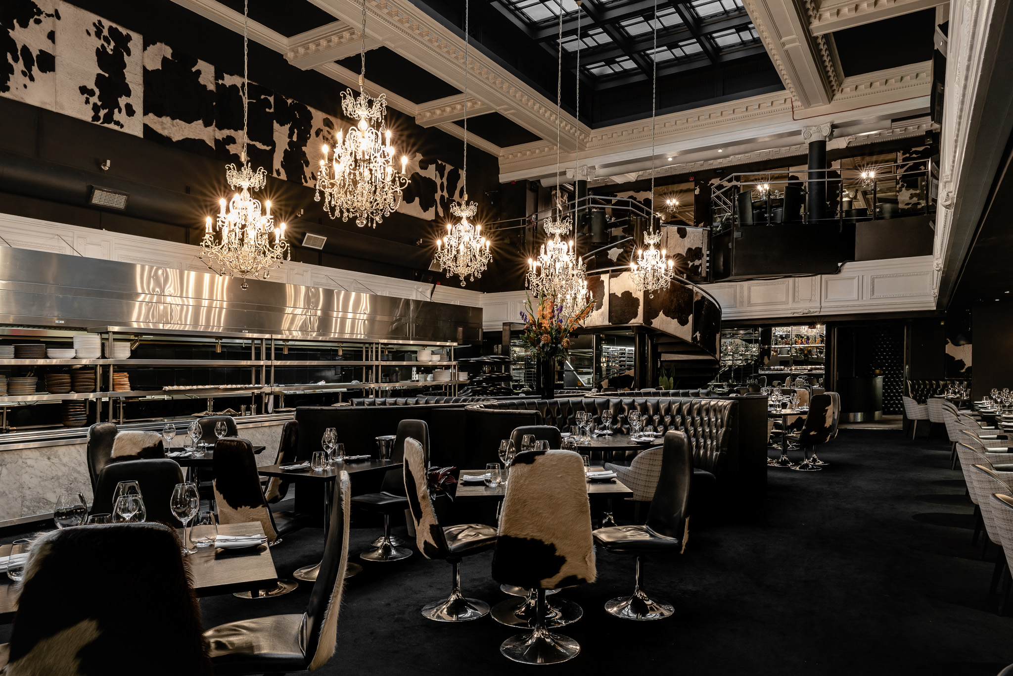 Stylish Gaucho Manchester venue with elegant chandeliers for corporate events and private dinners.