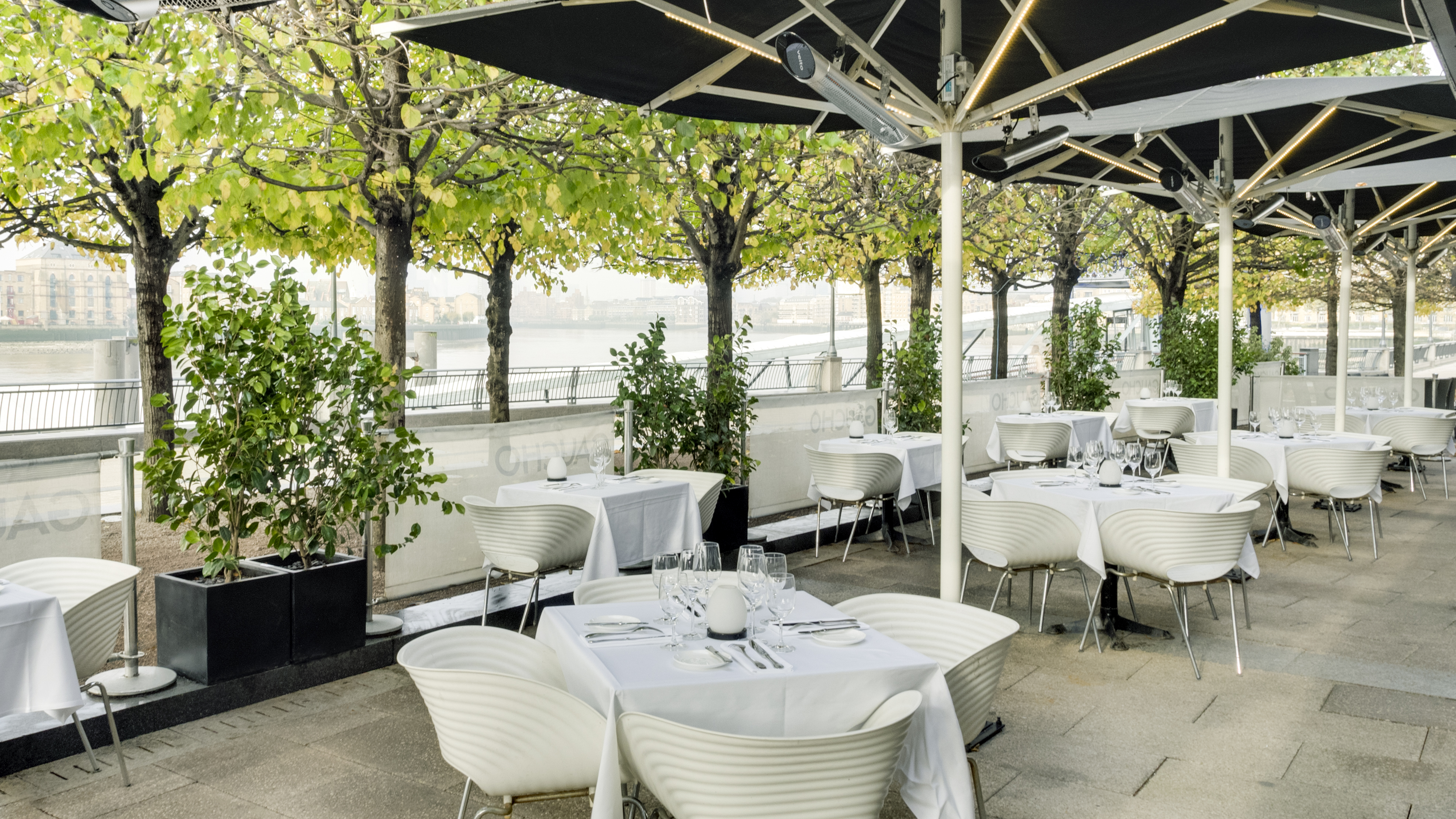 Stylish outdoor dining area at Gaucho Canary Wharf for upscale events and receptions.