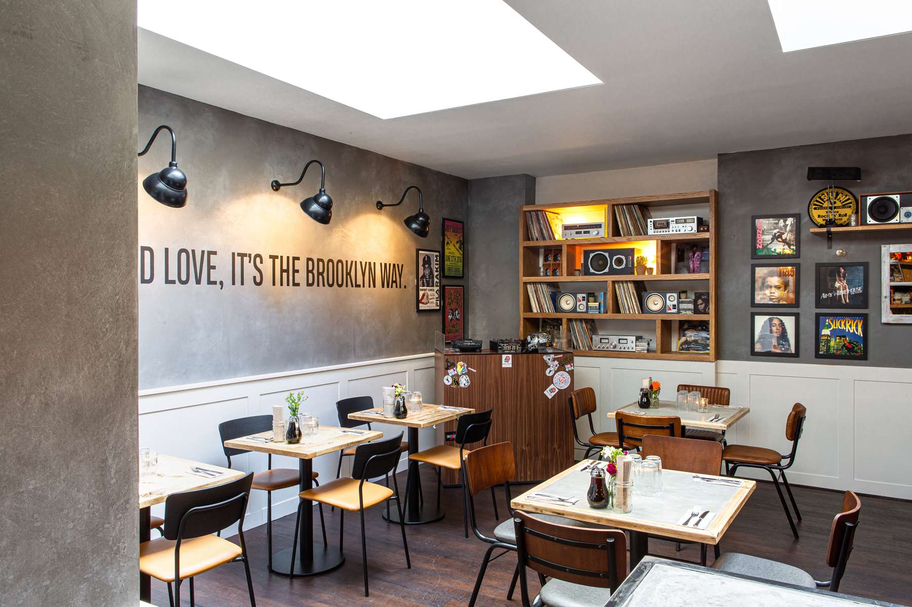 Cozy Record Shop venue with warm decor for intimate meetings and small events.