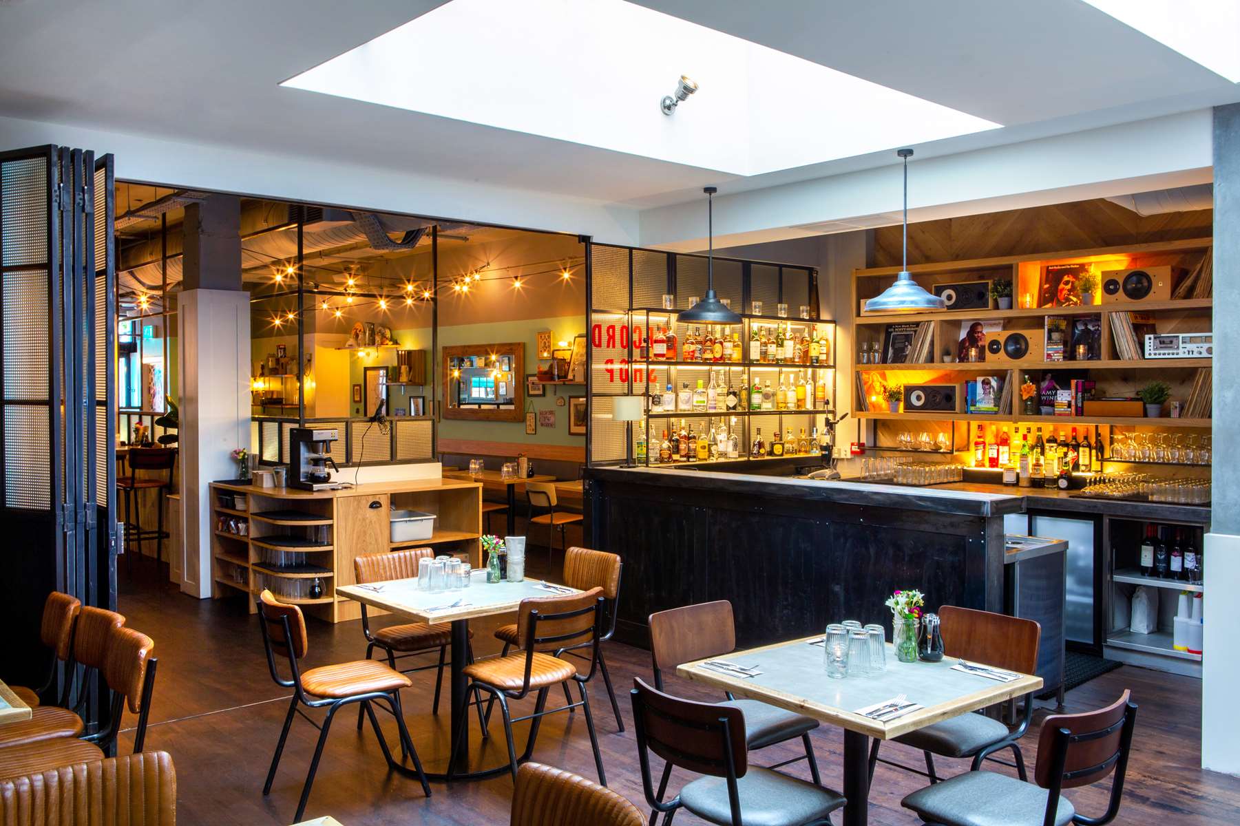 Stylish venue with skylight for networking events and casual gatherings at The Record Shop.