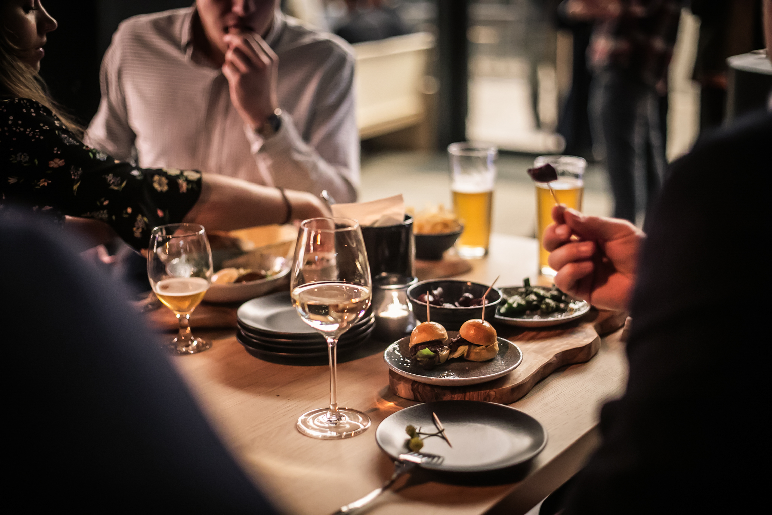 Alt text: Elegant networking event at Vagabond Canary Wharf with gourmet bites and beverages.