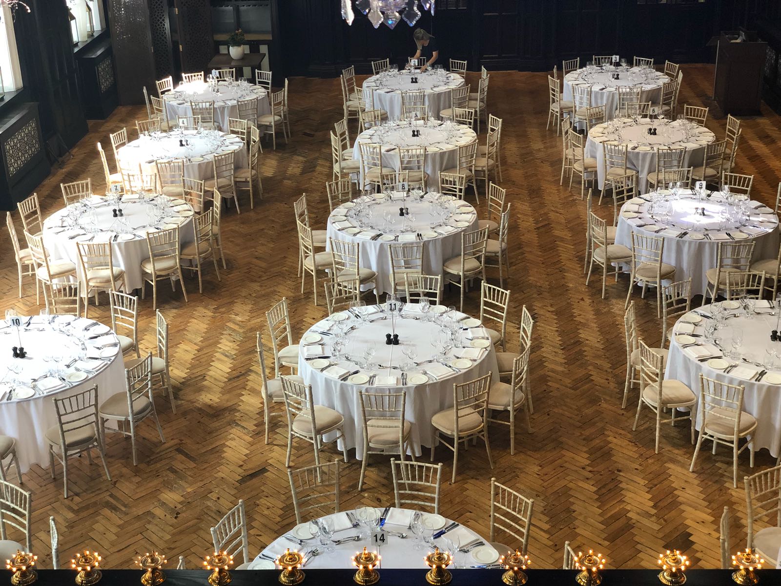 Elegant event setup with round tables in The Great Hall, perfect for banquets and conferences.