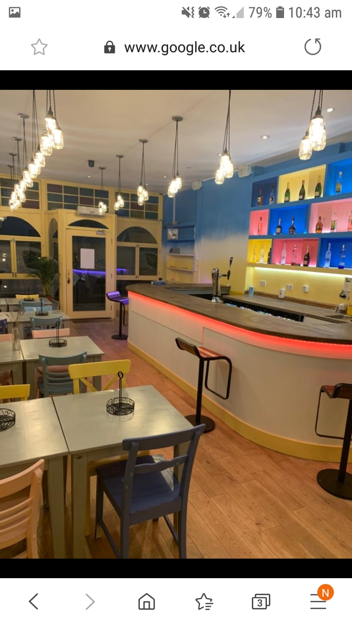 Vibrant bar area in Escape venue, perfect for networking events and social gatherings.