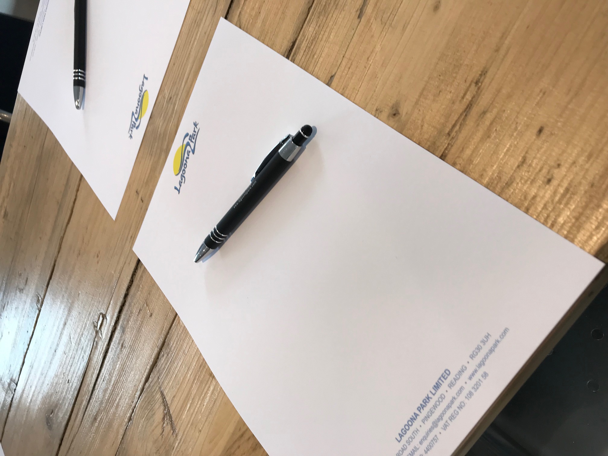 Whole Venue at Lagoona Bar & Grill with branded notepad and pen for meetings.