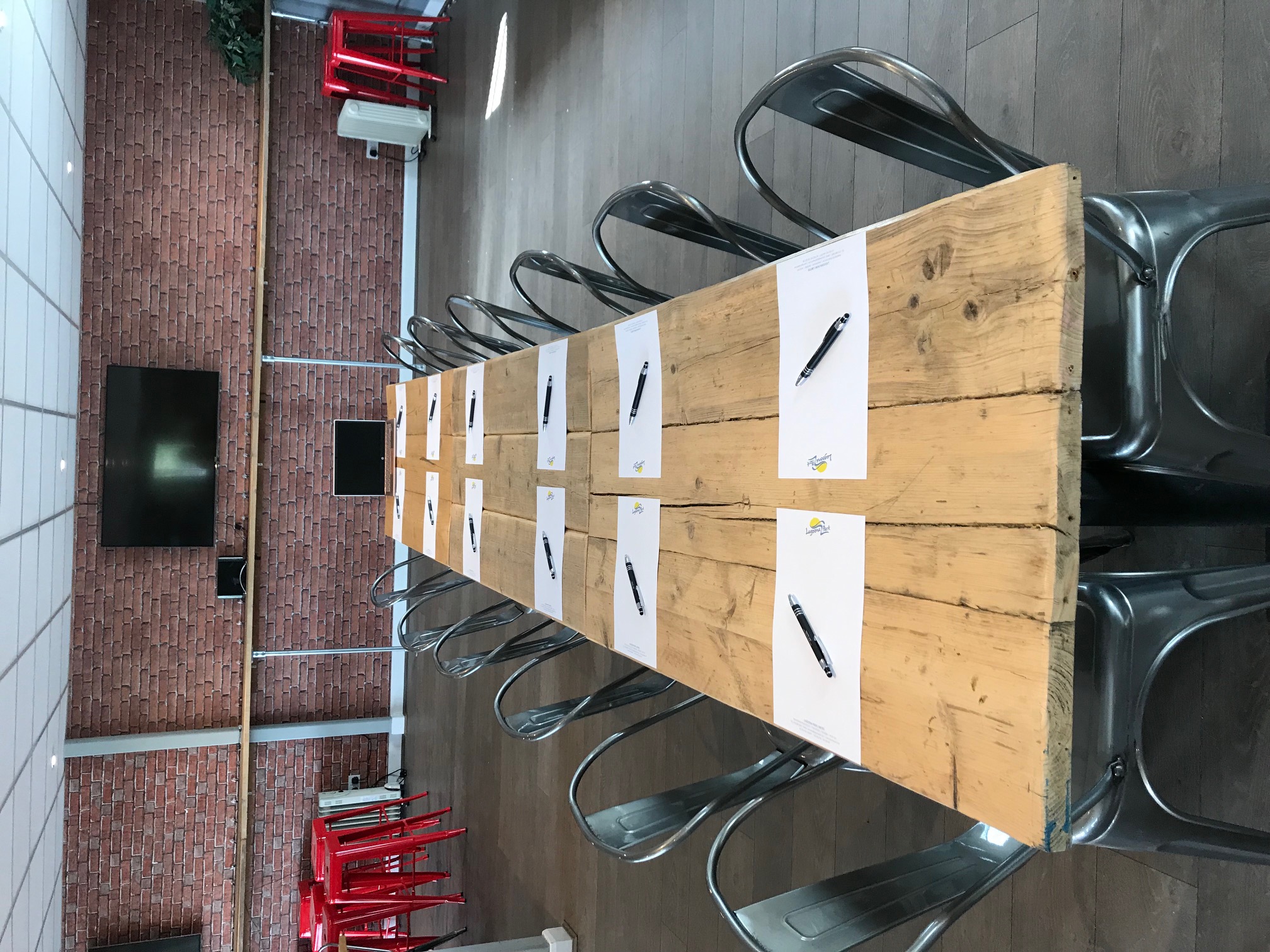 Whole Venue at Lagoona Bar & Grill with long table setup for meetings and events.