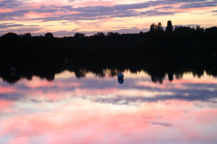 Serene sunset at Lagoona Bar & Grill, ideal for outdoor events and retreats.