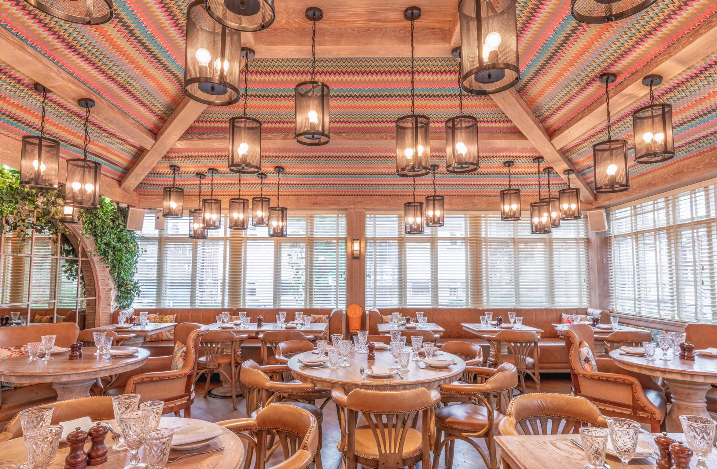 The Orangery in Victors: elegant event space with warm wood accents for upscale gatherings.