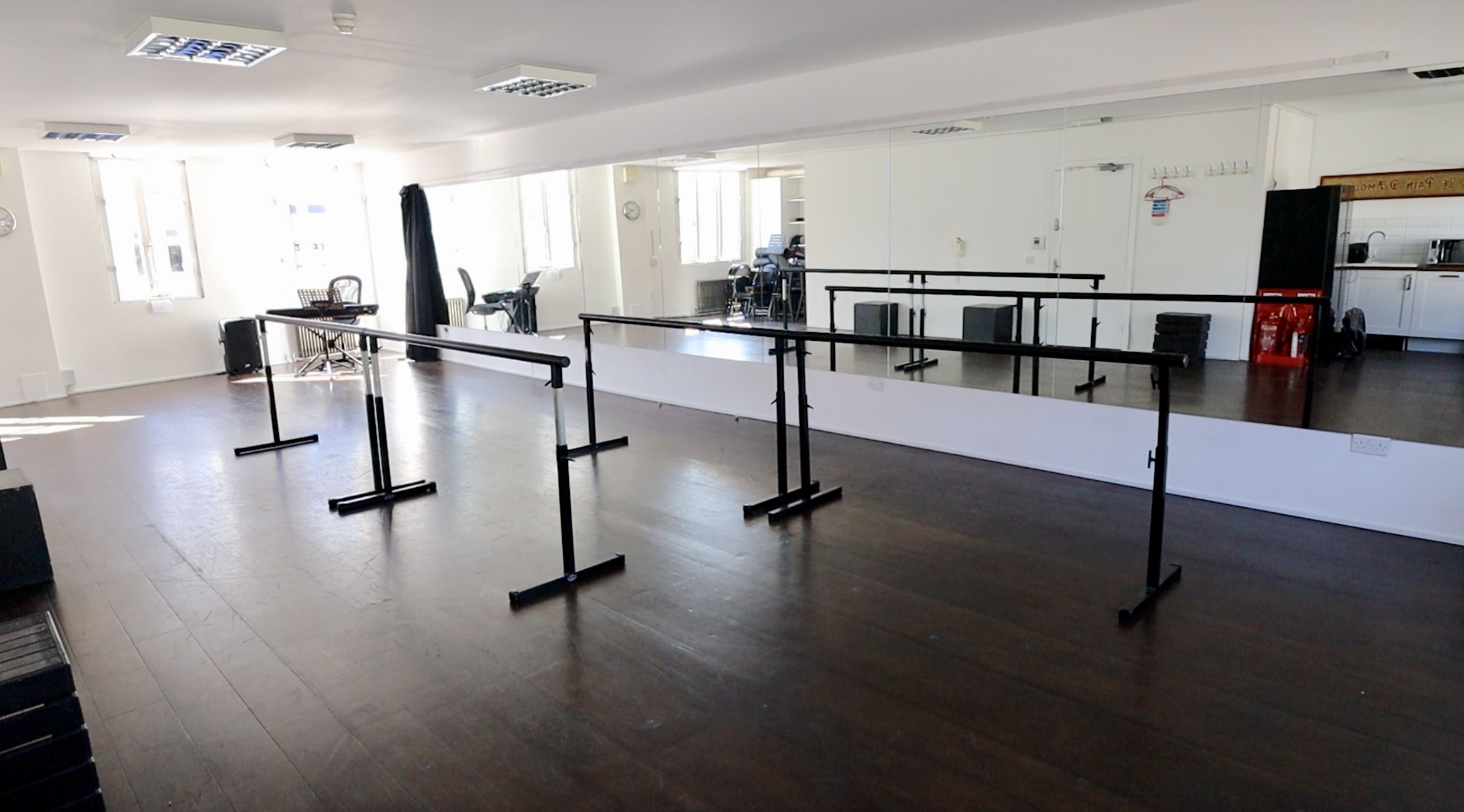 Versatile First Floor Studio with ballet bars, ideal for dance classes and fitness workshops.