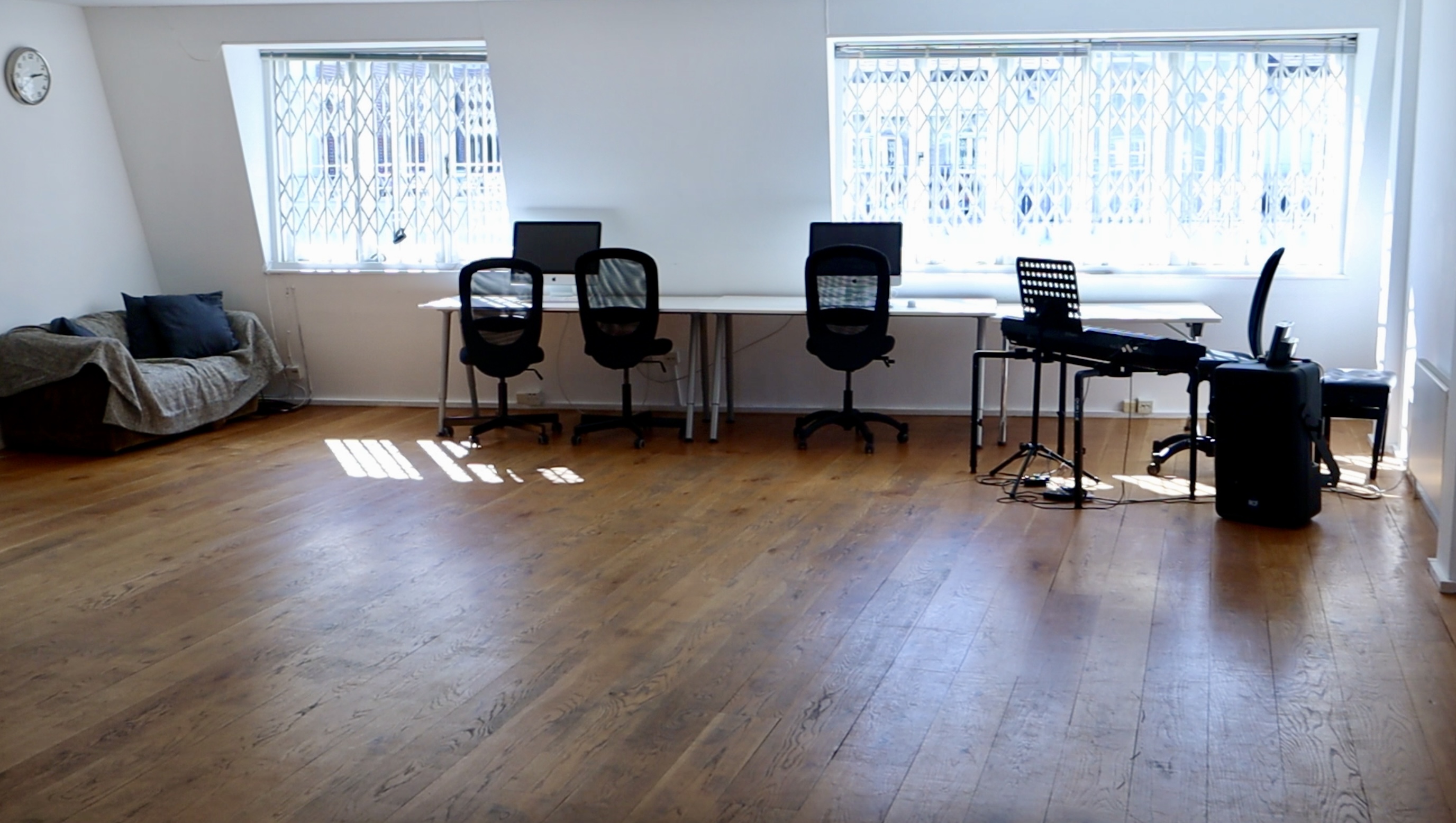 Bright, open workspace at Second Floor Studio for meetings and events.