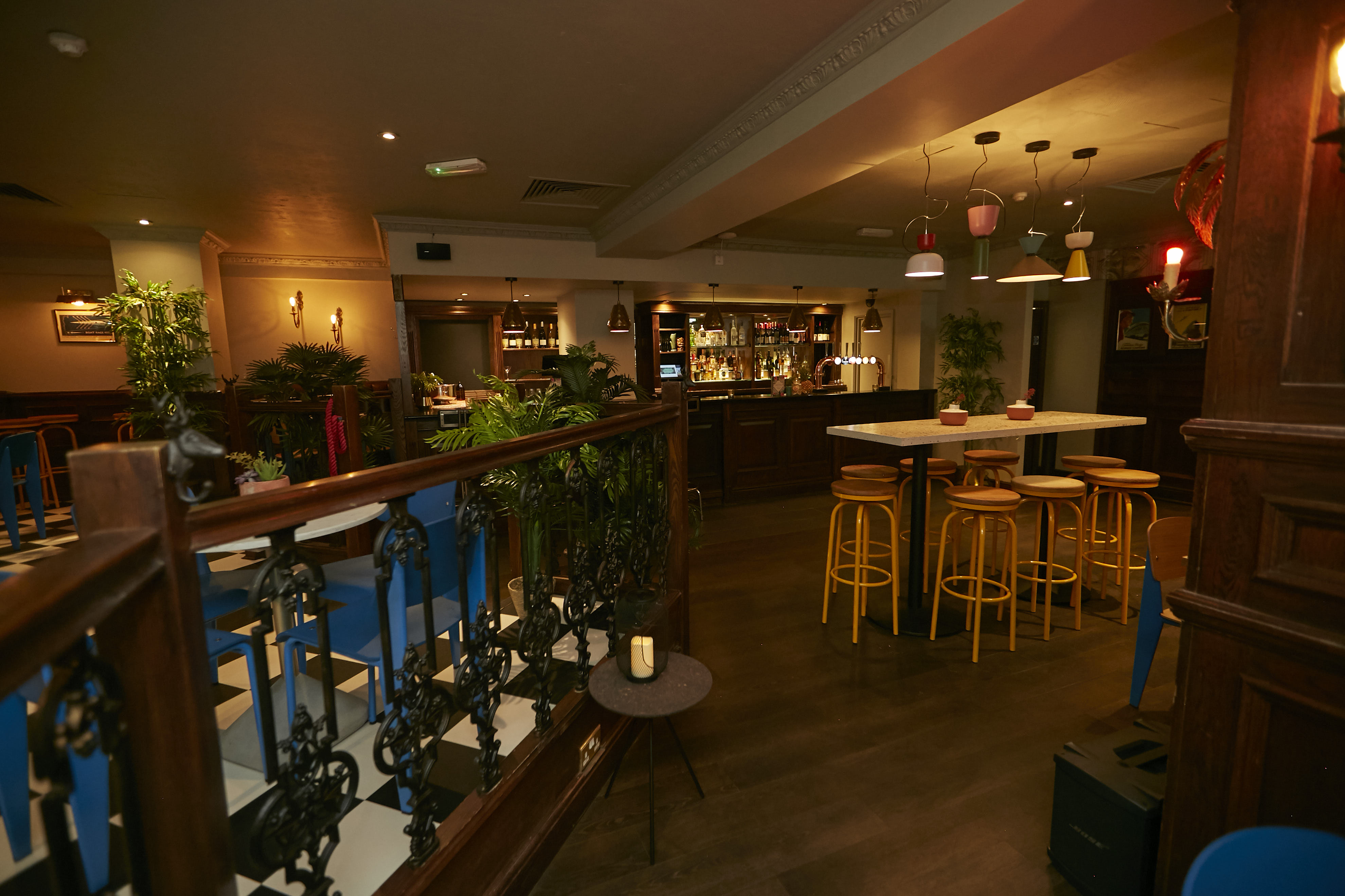 Stylish bar and restaurant with warm ambiance, perfect for networking events.