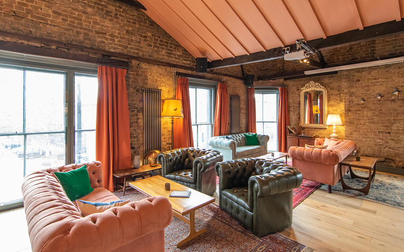 Stylish meeting space at The Bar Above, perfect for creative events and brainstorming.