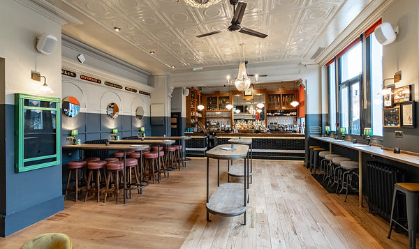 Stylish event space with vintage decor, ideal for networking and gatherings.