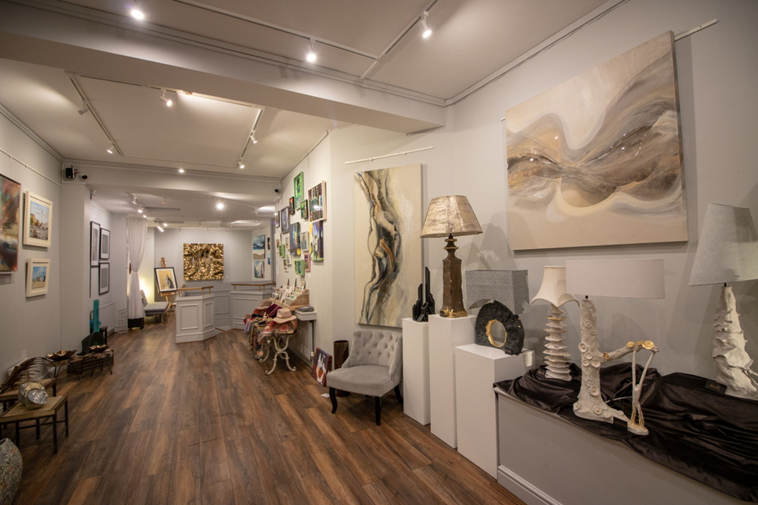 Sophisticated Upstairs Gallery with elegant decor, perfect for art exhibitions and intimate events.