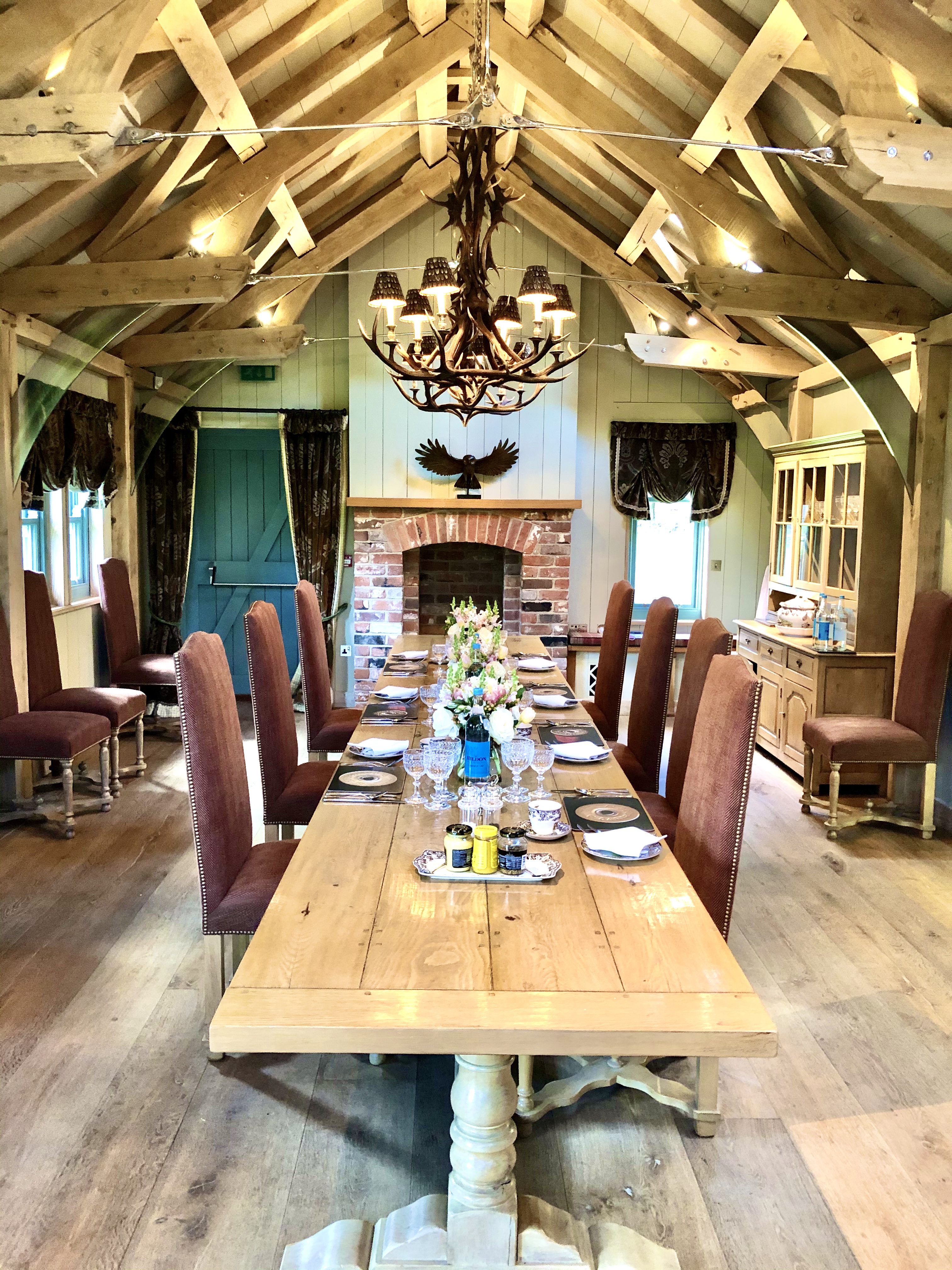 Woodland Lodge meeting space with elegant table settings for corporate retreats.