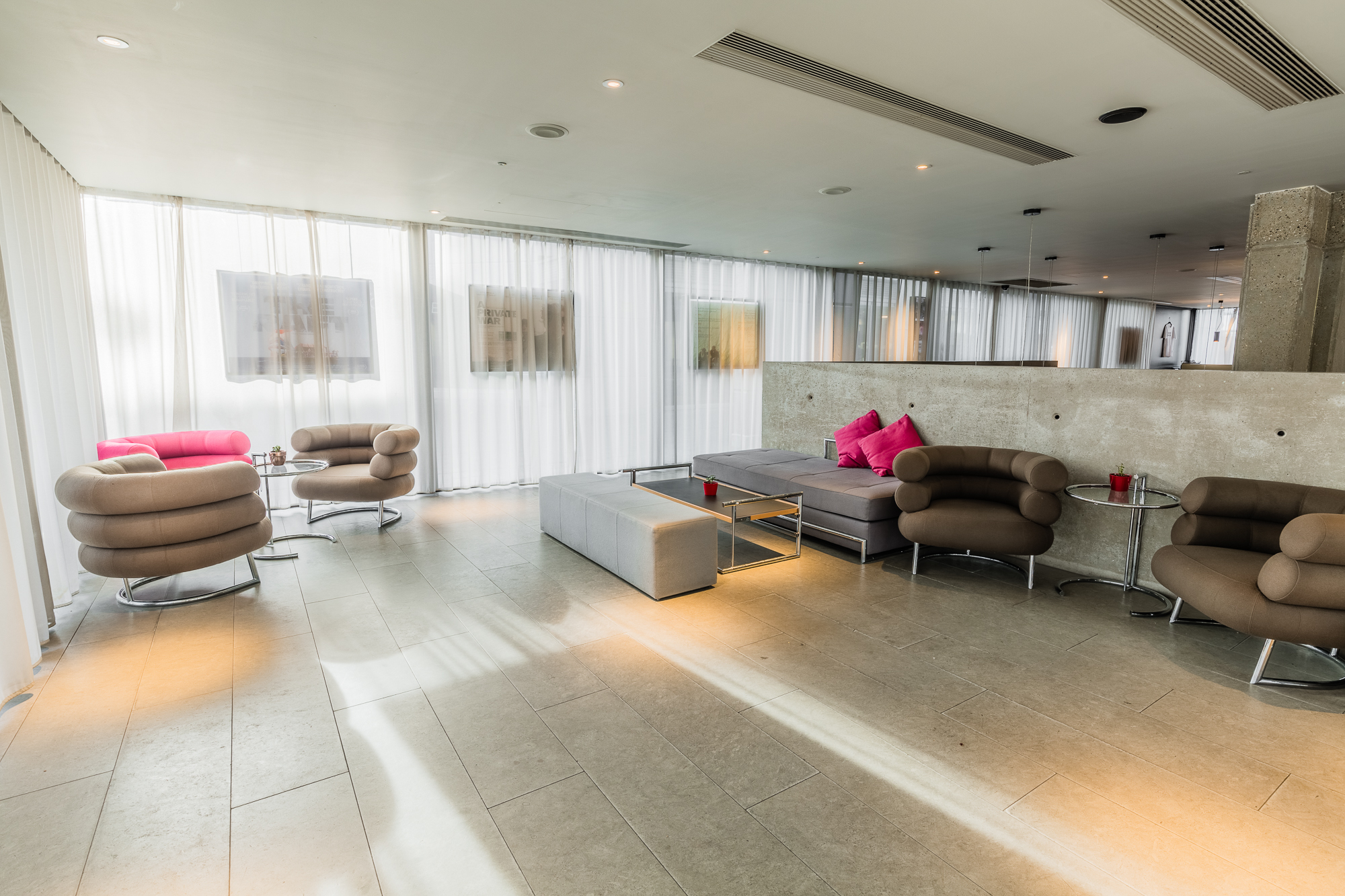 Modern lounge bar at Curzon Bloomsbury, ideal for networking events and meetings.