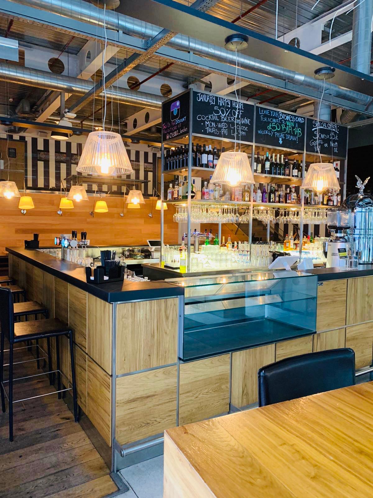 Modern bar setup at Whole Venue, 1882 - ideal for networking events and gatherings.