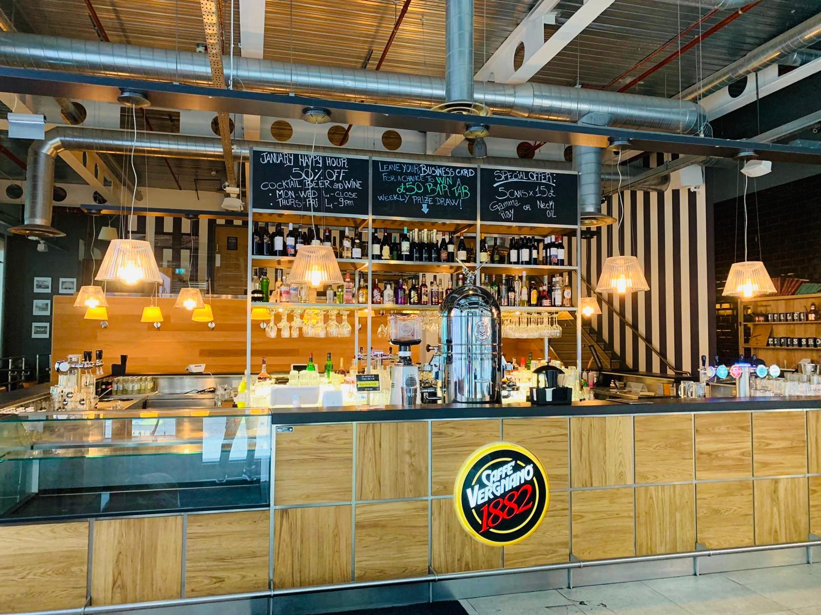 Modern bar setup at Whole Venue, 1882 Mark Lane, ideal for networking events and casual meetings.