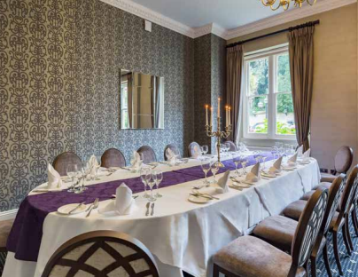 Elegant dining room in Fielden Suite, Nutfield Priory for upscale events and corporate dinners.