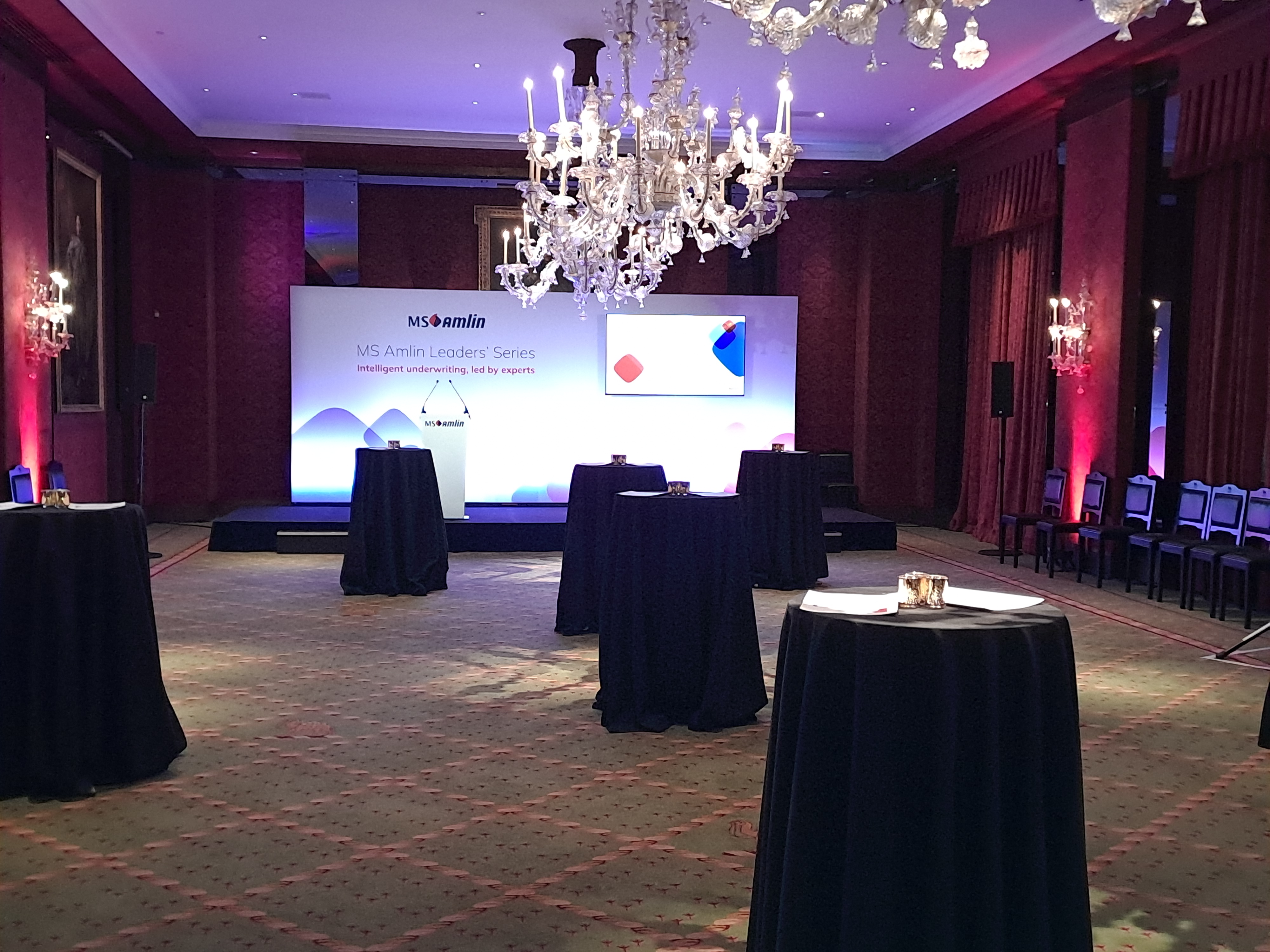 Elegant Livery Hall event space with chandelier, perfect for corporate networking.