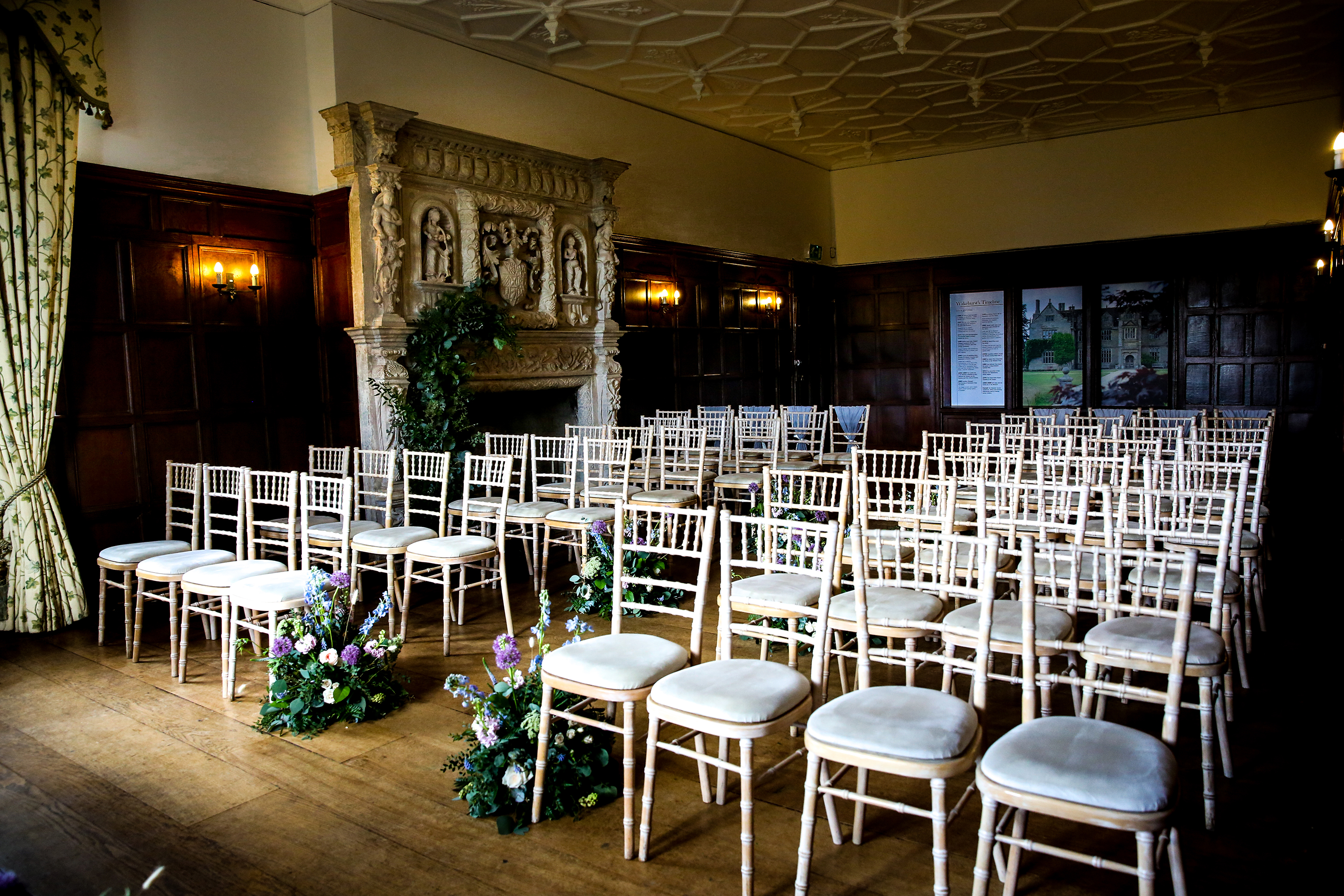 Elegant event space at The Library in Wakehurst with Chiavari chairs for ceremonies.
