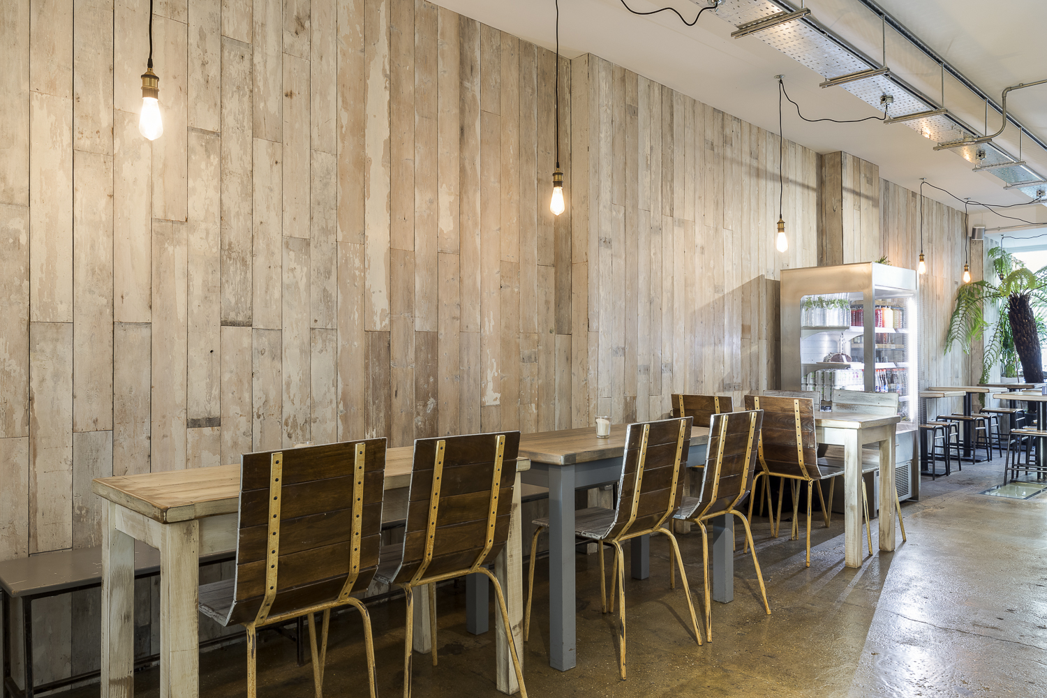 Modern rustic meeting space at Cafe Broadway Market, ideal for workshops and gatherings.