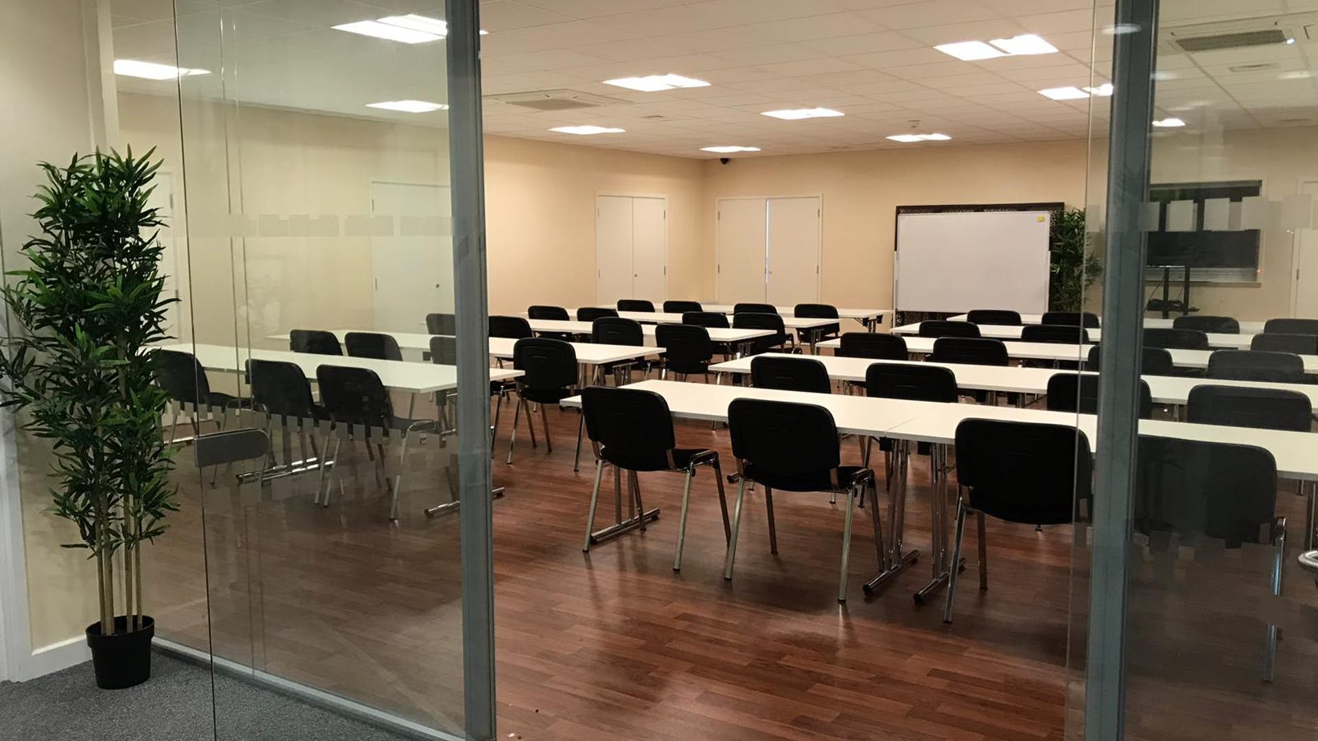 St Katherine Conference Hall with classroom layout, ideal for corporate workshops and training.