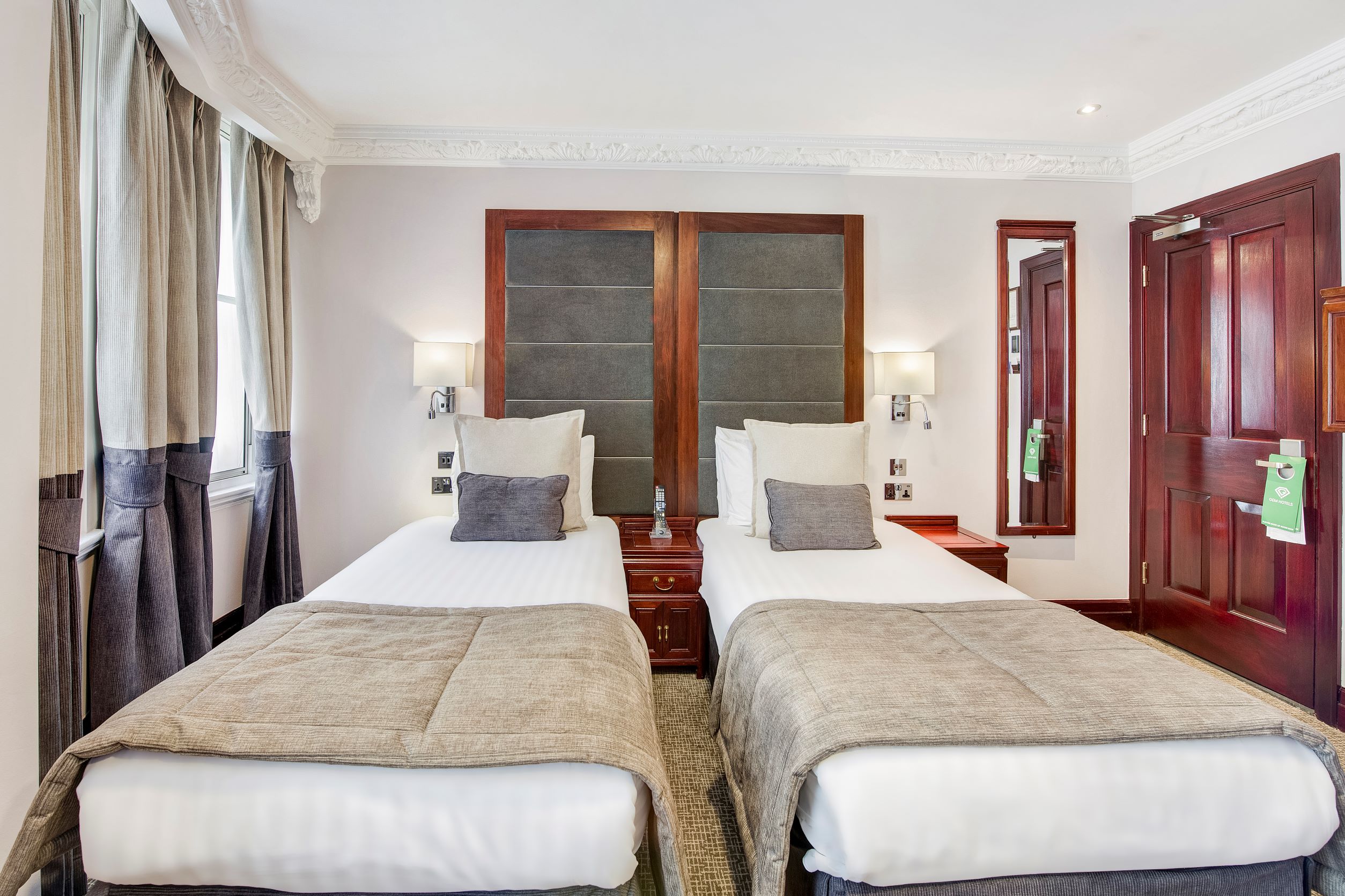 Cavendish Suite at Fitzrovia Hotel with twin beds, ideal for conferences and events.