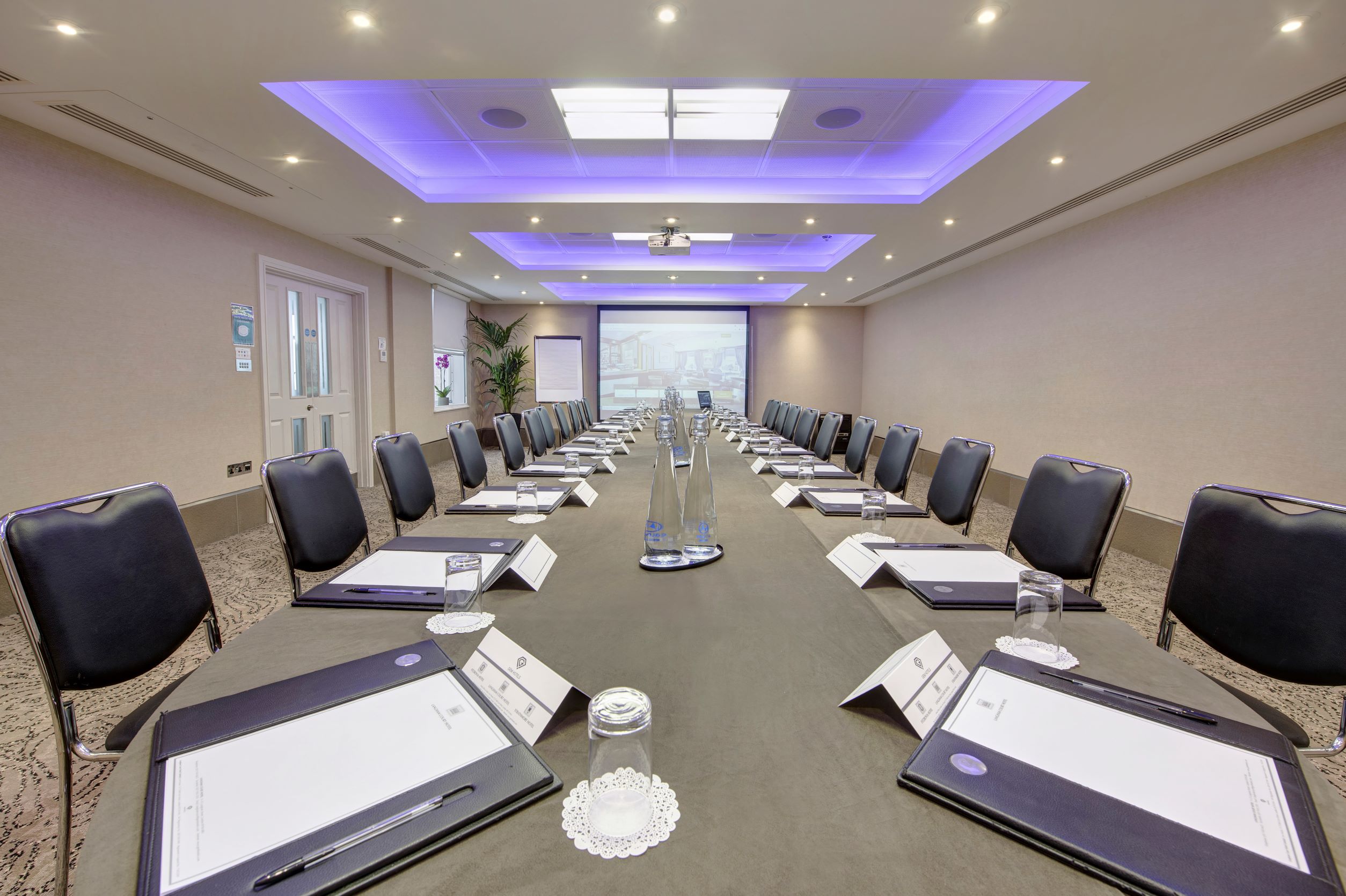 Titchfield Suite meeting room with long table, ready for professional events and presentations.