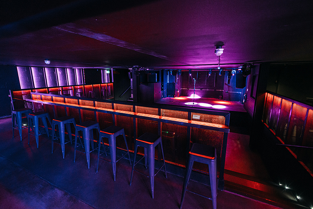 Modern event space in Peckham Audio with vibrant lighting for nightlife and gatherings.