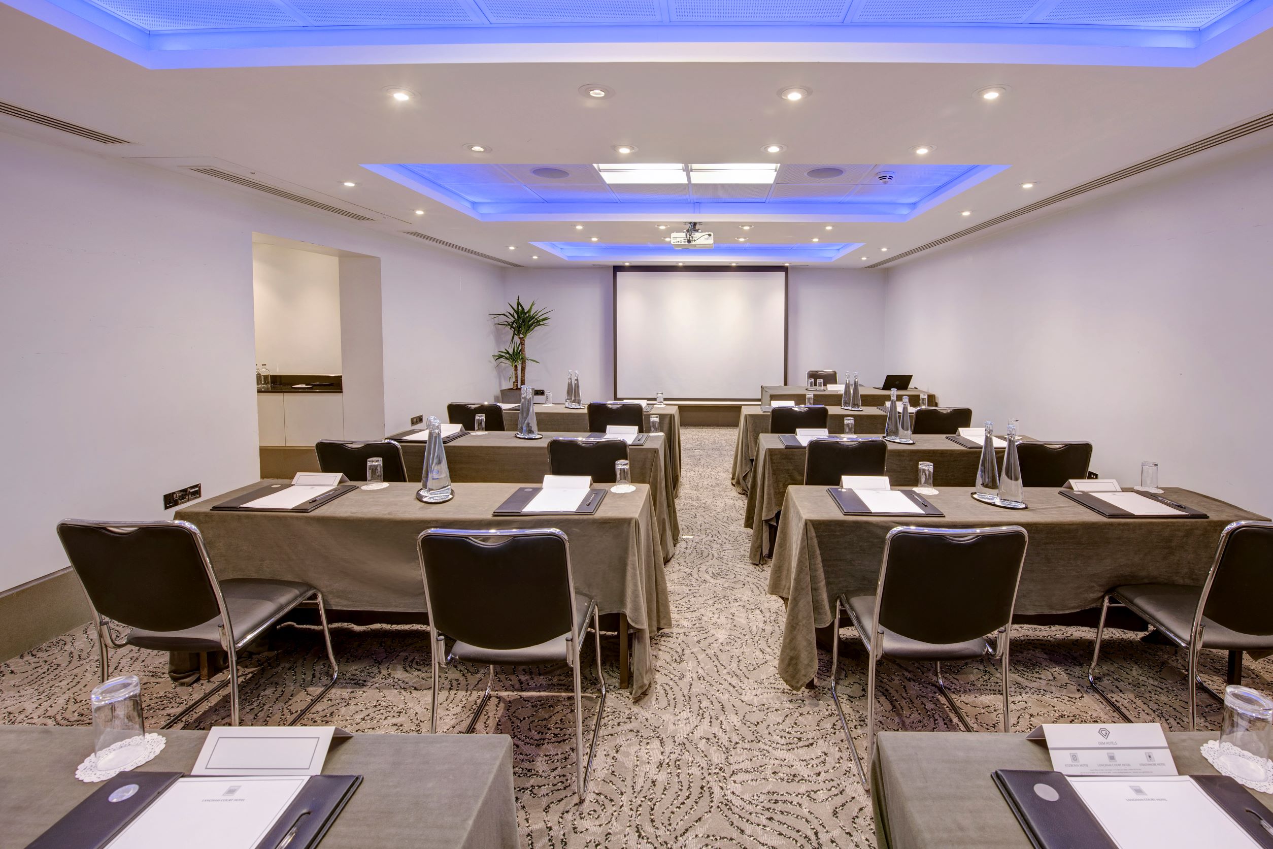 Langham Suite meeting room with modern AV setup for professional events and workshops.