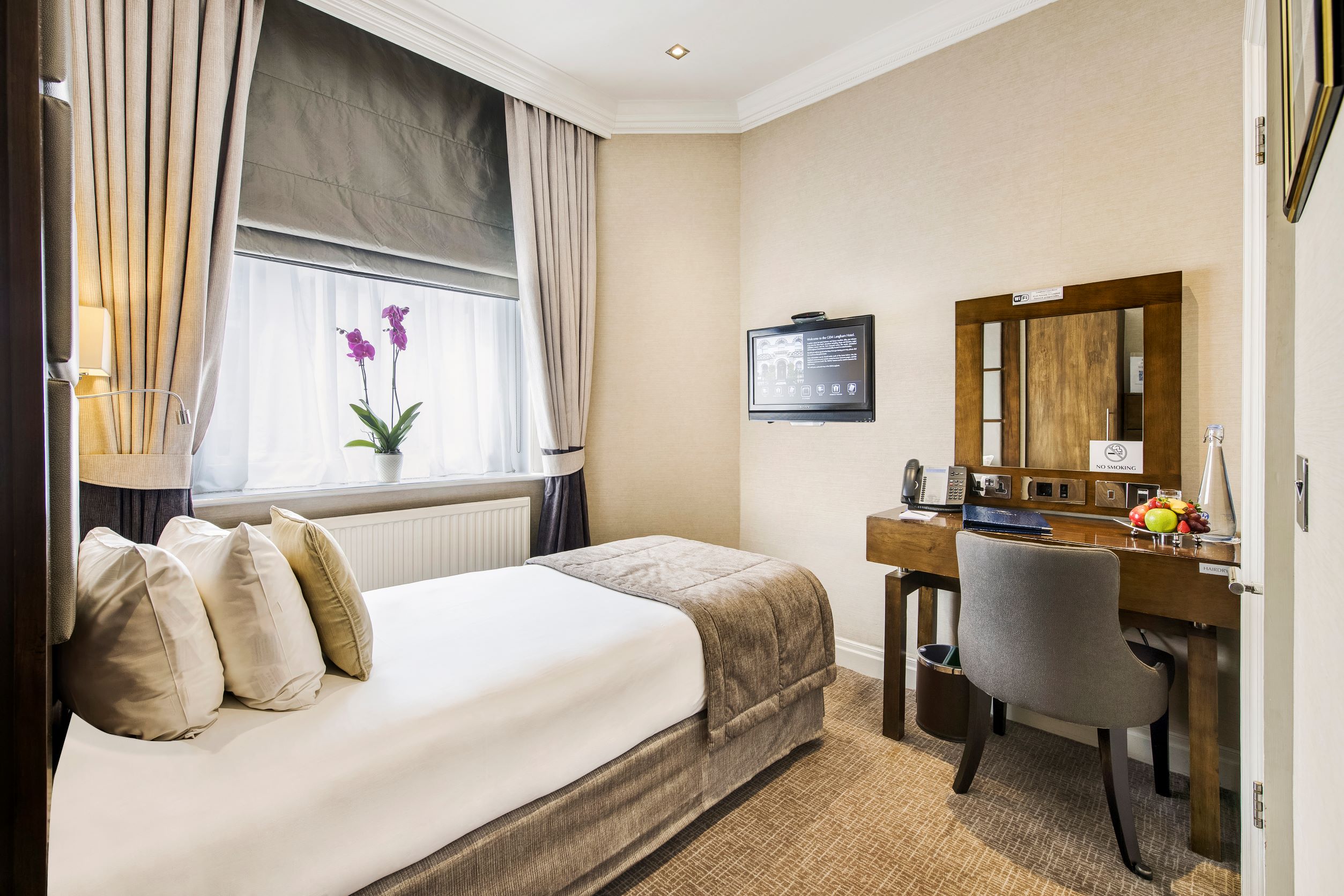 Langham Suite at Langham Court Hotel, cozy room for business events and meetings.