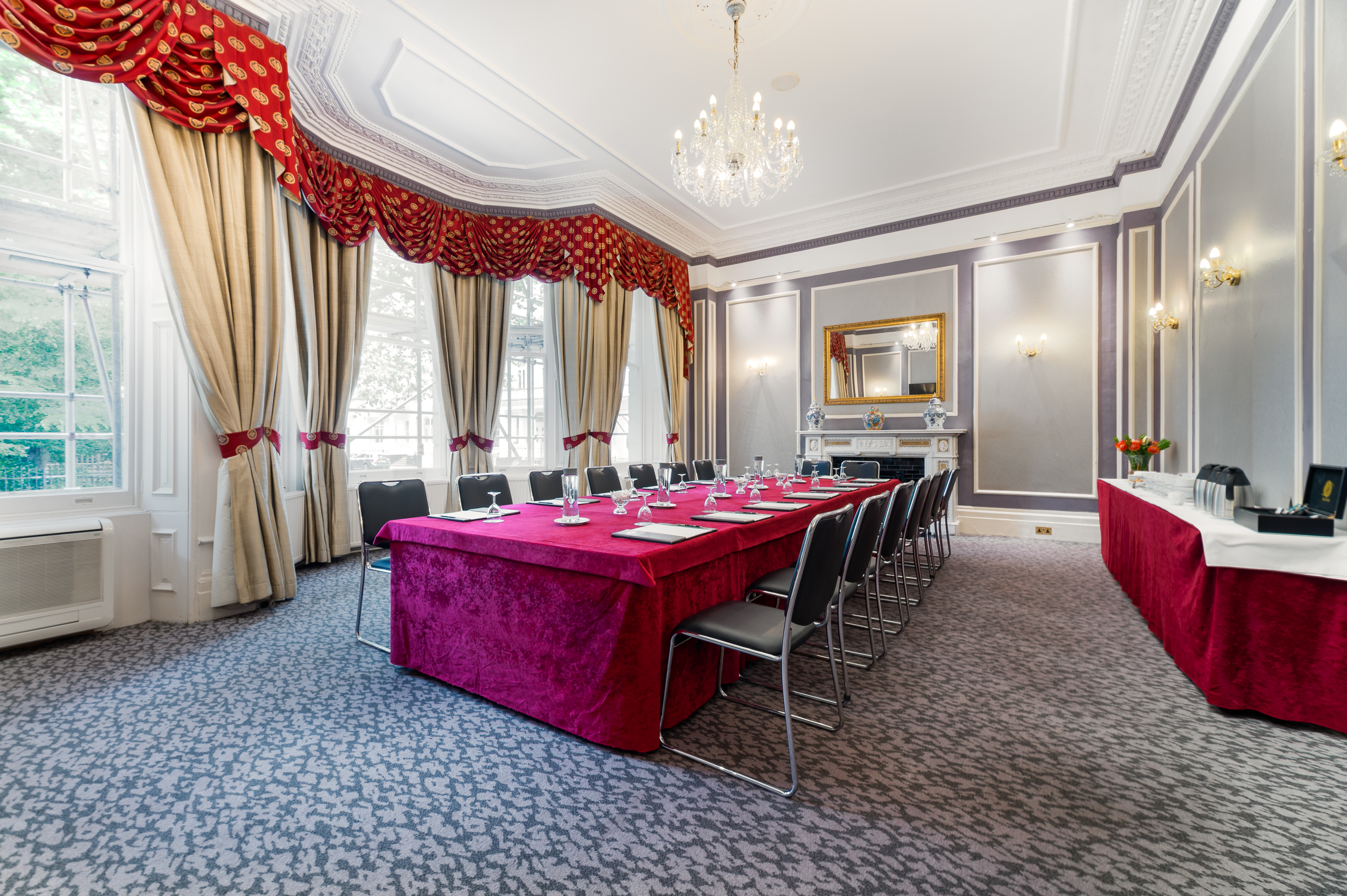 Library Suite at Gem Strathmore Hotel, elegant meeting room with chandelier, ideal for conferences.