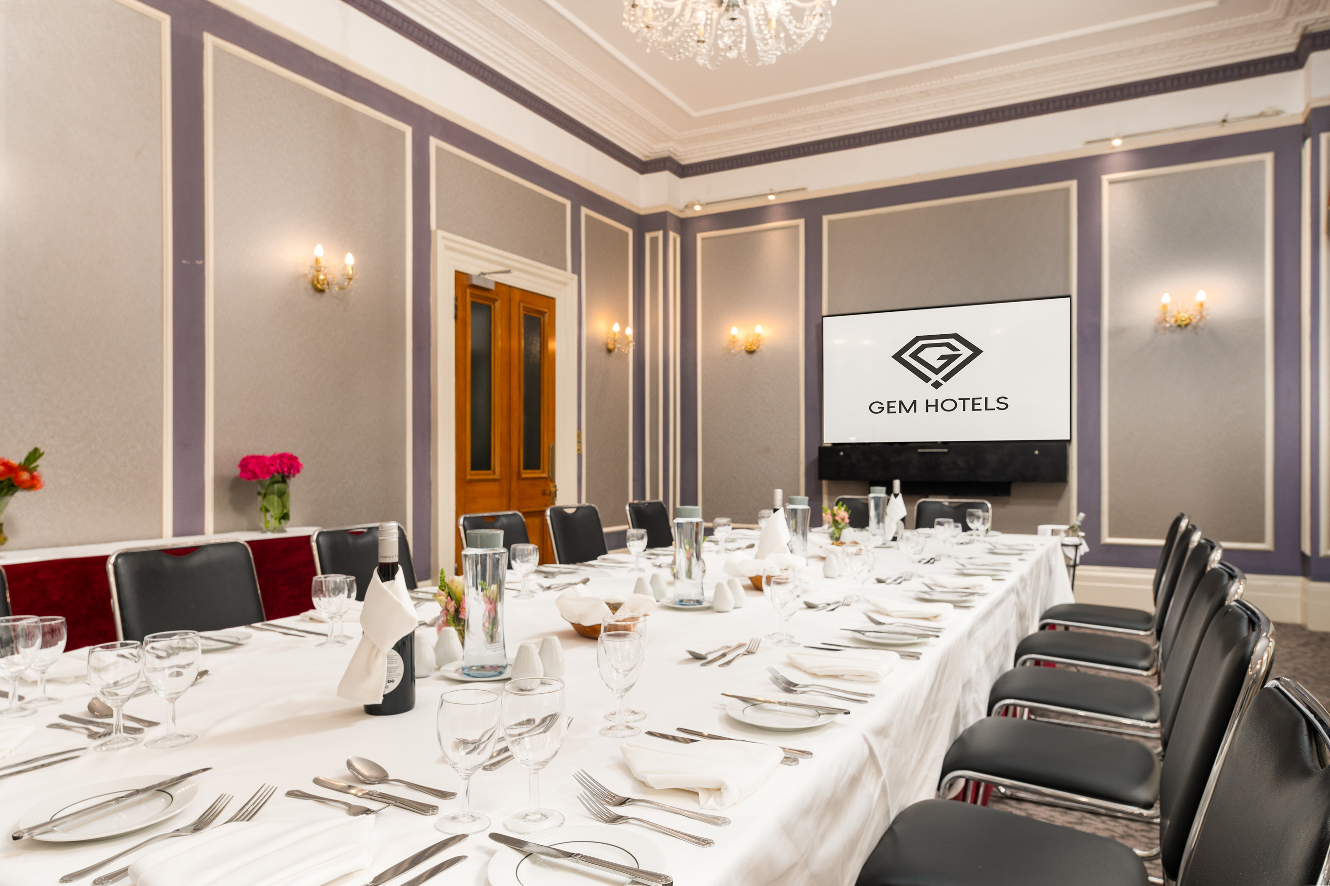 Elegant meeting room in Gem Strathmore Hotel, perfect for upscale events and presentations.