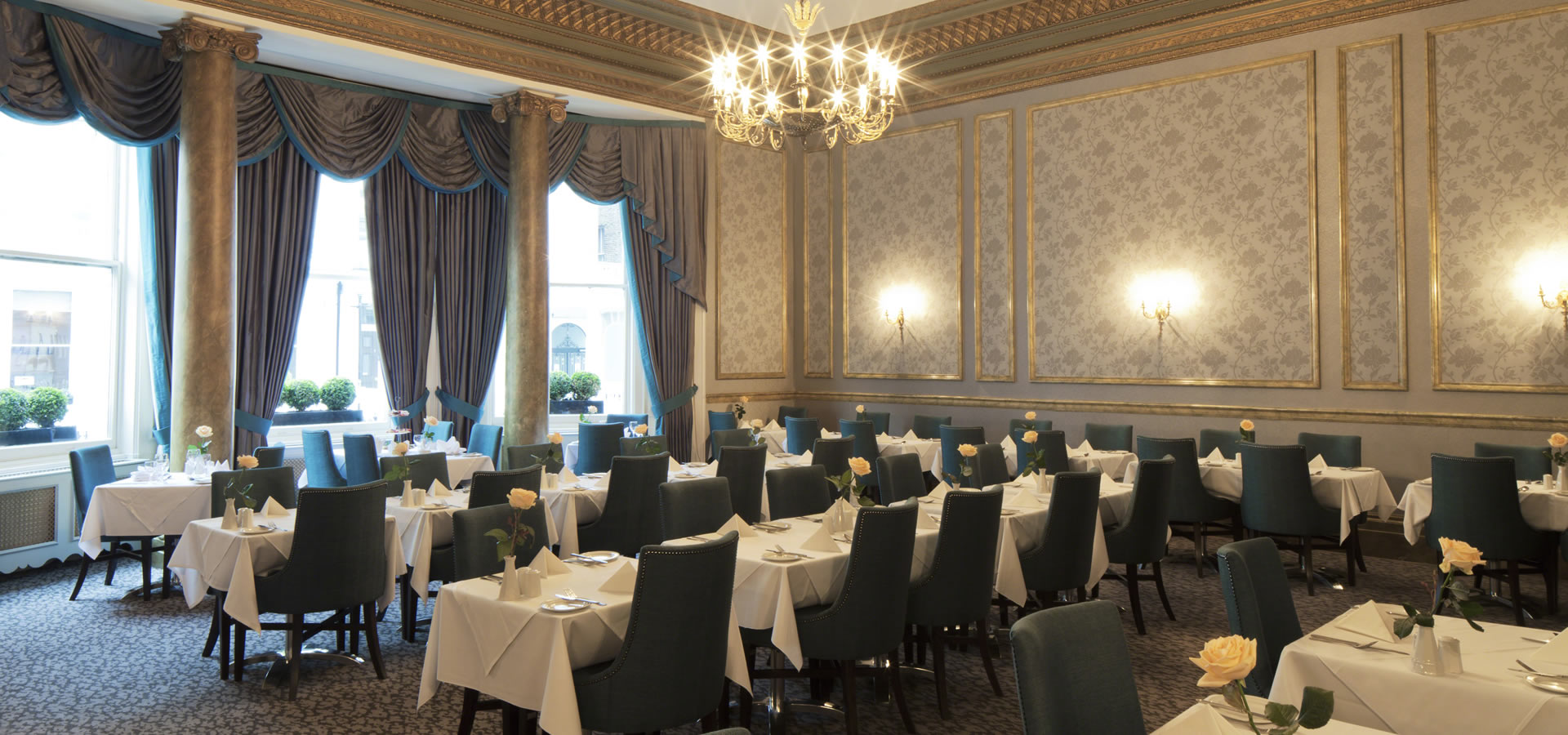 Elegant dining room in Gem Strathmore Hotel, perfect for formal events and upscale meetings.